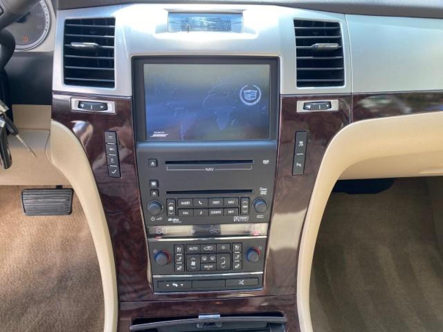 2010 White Diamond Tricoat /Cashmere/Cocoa Cadillac Escalade SUNROOF NAV Premium LOW MILES 66,933 (1GYUCCEF3AR) with an 6.2L Vortec 1000 V8 SFI E85 Engine engine, Automatic transmission, located at 4701 North Dixie Hwy, Pompano Beach, FL, 33064, (954) 422-2889, 26.240938, -80.123474 - OUR WEBPAGE FLORIDACARS1.COM HAS OVER 100 PHOTOS AND FREE CARFAX LINK 2010 Cadillac Escalade Premium 4 Door Wagon/Sport Utility 6.2L V8 F OHV 16V Flex Fuel 20 MPG Rear Wheel Drive Features A/C Seat(s) ABS Brakes Air Conditioning Alloy Wheels AM/FM Stereo Automatic Transmission Auxiliary Audio Input- Photo#60