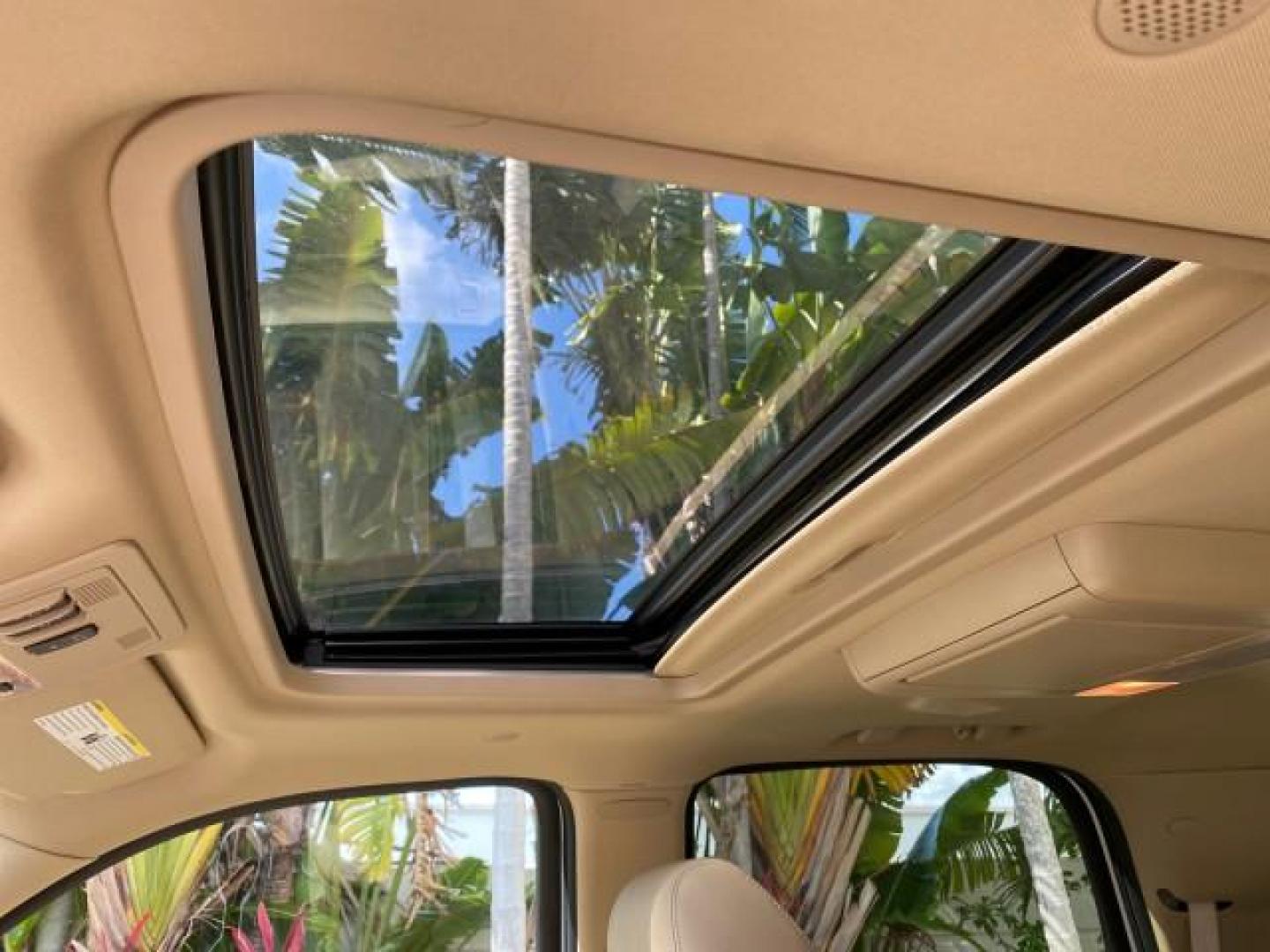 2010 White Diamond Tricoat /Cashmere/Cocoa Cadillac Escalade SUNROOF NAV Premium LOW MILES 66,933 (1GYUCCEF3AR) with an 6.2L Vortec 1000 V8 SFI E85 Engine engine, Automatic transmission, located at 4701 North Dixie Hwy, Pompano Beach, FL, 33064, (954) 422-2889, 26.240938, -80.123474 - OUR WEBPAGE FLORIDACARS1.COM HAS OVER 100 PHOTOS AND FREE CARFAX LINK 2010 Cadillac Escalade Premium 4 Door Wagon/Sport Utility 6.2L V8 F OHV 16V Flex Fuel 20 MPG Rear Wheel Drive Features A/C Seat(s) ABS Brakes Air Conditioning Alloy Wheels AM/FM Stereo Automatic Transmission Auxiliary Audio Input- Photo#77