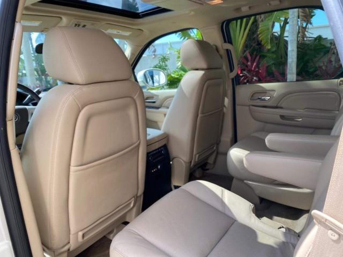 2010 White Diamond Tricoat /Cashmere/Cocoa Cadillac Escalade SUNROOF NAV Premium LOW MILES 66,933 (1GYUCCEF3AR) with an 6.2L Vortec 1000 V8 SFI E85 Engine engine, Automatic transmission, located at 4701 North Dixie Hwy, Pompano Beach, FL, 33064, (954) 422-2889, 26.240938, -80.123474 - OUR WEBPAGE FLORIDACARS1.COM HAS OVER 100 PHOTOS AND FREE CARFAX LINK 2010 Cadillac Escalade Premium 4 Door Wagon/Sport Utility 6.2L V8 F OHV 16V Flex Fuel 20 MPG Rear Wheel Drive Features A/C Seat(s) ABS Brakes Air Conditioning Alloy Wheels AM/FM Stereo Automatic Transmission Auxiliary Audio Input- Photo#88