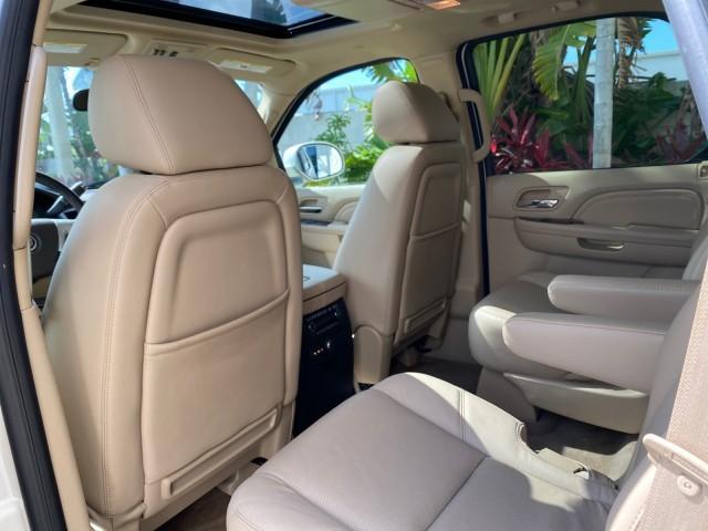 2010 White Diamond Tricoat /Cashmere/Cocoa Cadillac Escalade SUNROOF NAV Premium LOW MILES 66,933 (1GYUCCEF3AR) with an 6.2L Vortec 1000 V8 SFI E85 Engine engine, Automatic transmission, located at 4701 North Dixie Hwy, Pompano Beach, FL, 33064, (954) 422-2889, 26.240938, -80.123474 - OUR WEBPAGE FLORIDACARS1.COM HAS OVER 100 PHOTOS AND FREE CARFAX LINK 2010 Cadillac Escalade Premium 4 Door Wagon/Sport Utility 6.2L V8 F OHV 16V Flex Fuel 20 MPG Rear Wheel Drive Features A/C Seat(s) ABS Brakes Air Conditioning Alloy Wheels AM/FM Stereo Automatic Transmission Auxiliary Audio Input - Photo#88