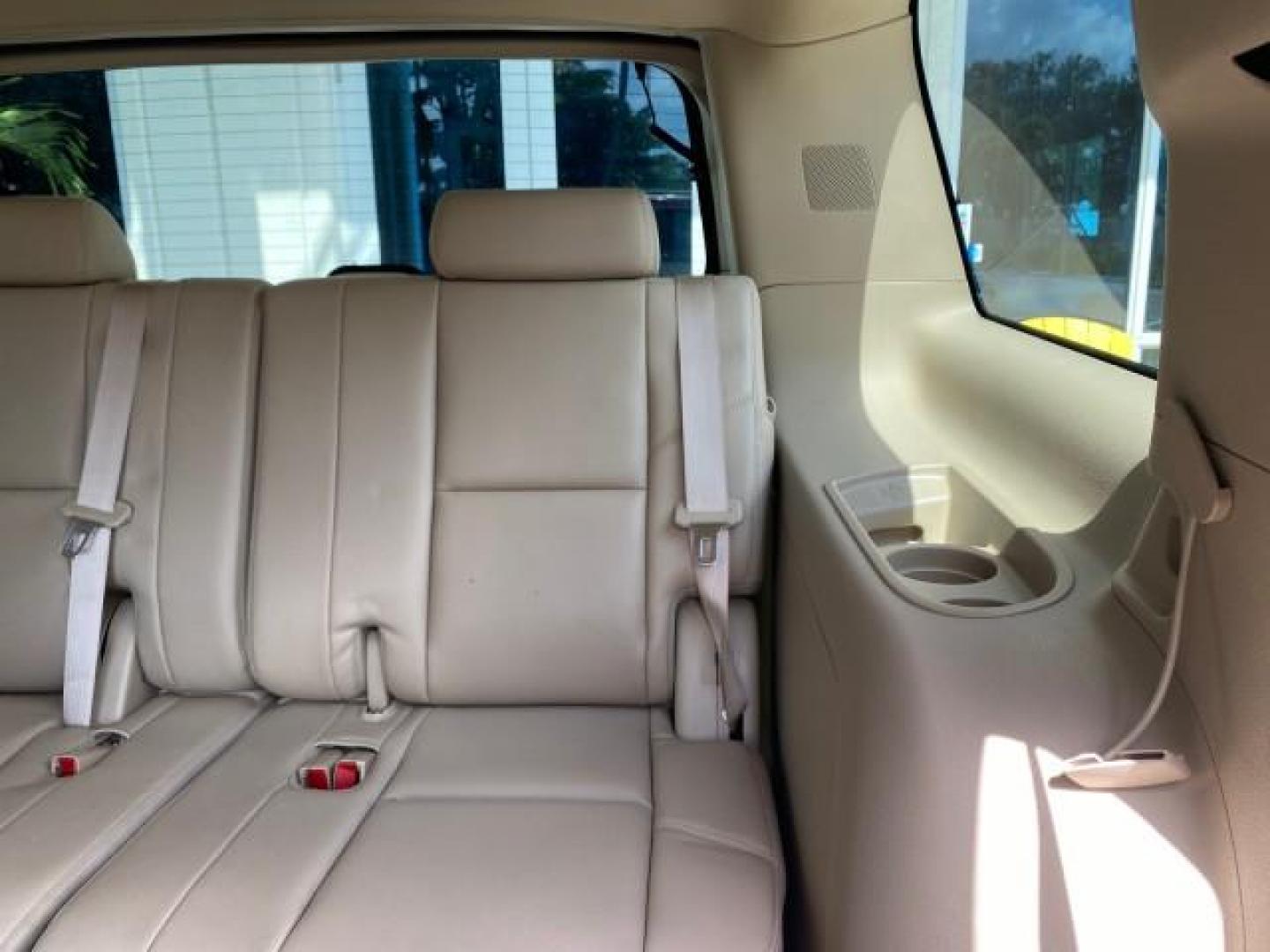 2010 White Diamond Tricoat /Cashmere/Cocoa Cadillac Escalade SUNROOF NAV Premium LOW MILES 66,933 (1GYUCCEF3AR) with an 6.2L Vortec 1000 V8 SFI E85 Engine engine, Automatic transmission, located at 4701 North Dixie Hwy, Pompano Beach, FL, 33064, (954) 422-2889, 26.240938, -80.123474 - OUR WEBPAGE FLORIDACARS1.COM HAS OVER 100 PHOTOS AND FREE CARFAX LINK 2010 Cadillac Escalade Premium 4 Door Wagon/Sport Utility 6.2L V8 F OHV 16V Flex Fuel 20 MPG Rear Wheel Drive Features A/C Seat(s) ABS Brakes Air Conditioning Alloy Wheels AM/FM Stereo Automatic Transmission Auxiliary Audio Input- Photo#96