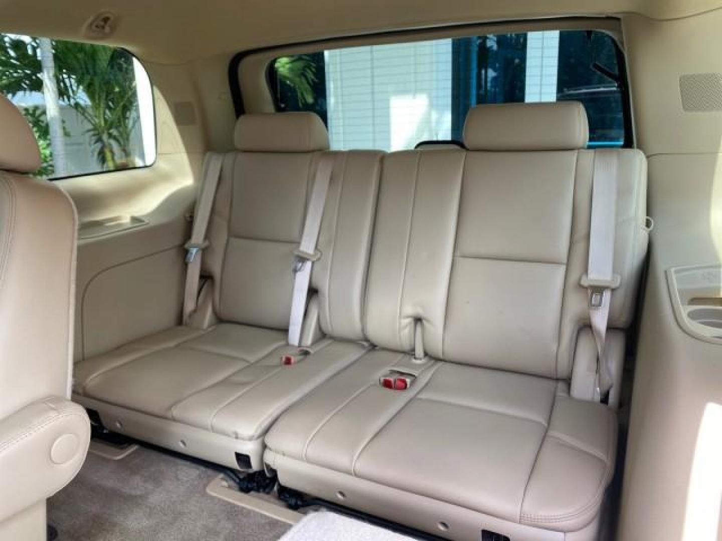 2010 White Diamond Tricoat /Cashmere/Cocoa Cadillac Escalade SUNROOF NAV Premium LOW MILES 66,933 (1GYUCCEF3AR) with an 6.2L Vortec 1000 V8 SFI E85 Engine engine, Automatic transmission, located at 4701 North Dixie Hwy, Pompano Beach, FL, 33064, (954) 422-2889, 26.240938, -80.123474 - OUR WEBPAGE FLORIDACARS1.COM HAS OVER 100 PHOTOS AND FREE CARFAX LINK 2010 Cadillac Escalade Premium 4 Door Wagon/Sport Utility 6.2L V8 F OHV 16V Flex Fuel 20 MPG Rear Wheel Drive Features A/C Seat(s) ABS Brakes Air Conditioning Alloy Wheels AM/FM Stereo Automatic Transmission Auxiliary Audio Input- Photo#97
