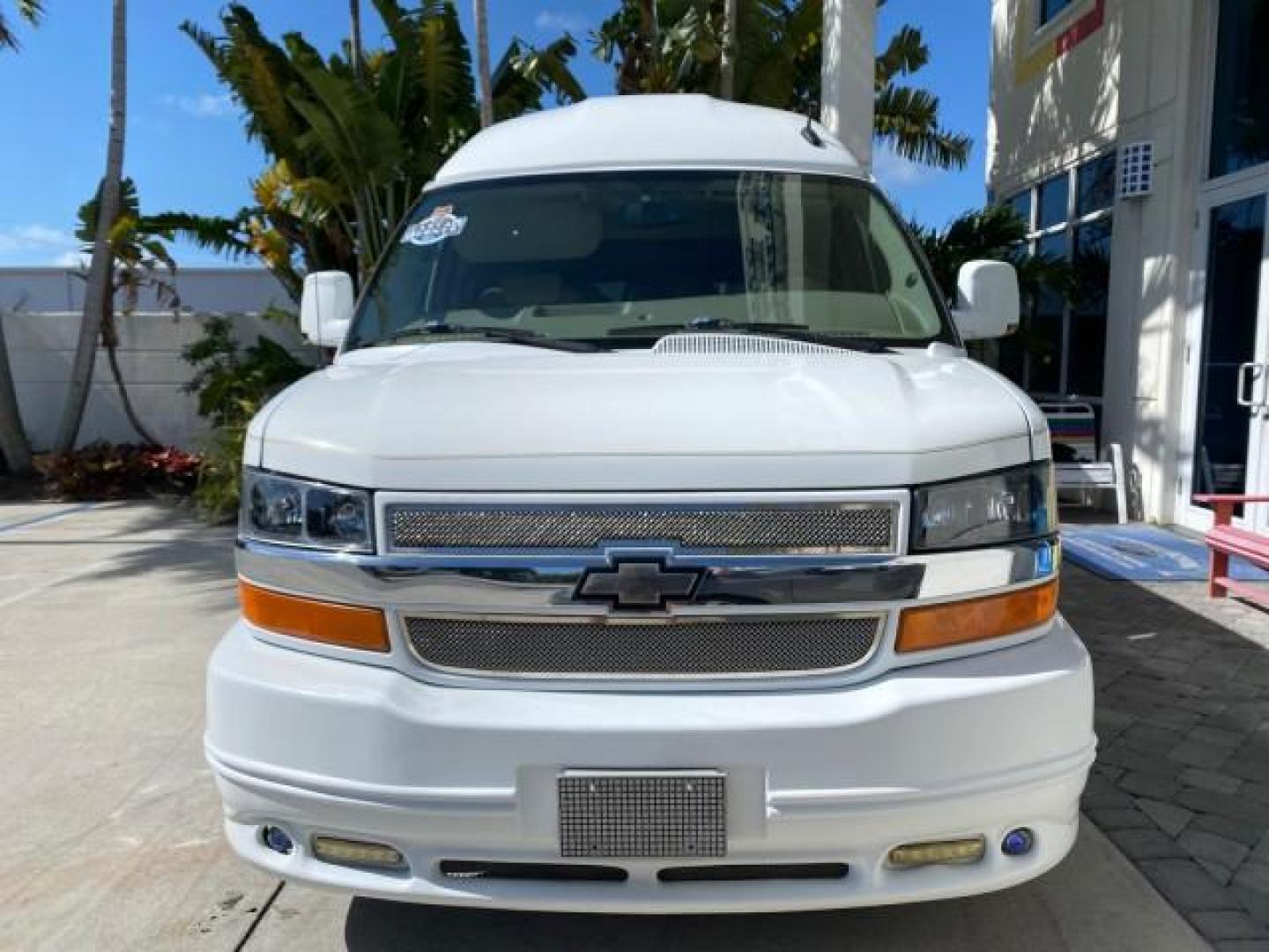 2012 Summit White /Neutral Chevrolet Express EXTENDED HIGH TOP CONVERSION 1 OWNER LOW MILES 36,054 (1GBWGLCG9C1) with an 6.0L Vortec 1000 V8 SFI Flex-Fuel Engine engine, Automatic transmission, located at 4701 North Dixie Hwy, Pompano Beach, FL, 33064, (954) 422-2889, 26.240938, -80.123474 - OUR WEBPAGE FLORIDACARS1.COM HAS OVER 100 PHOTOS AND FREE CARFAX LINK 2012 Chevrolet Express EXTENDED HIGH TOP CONVERSION VAN 1 OWNER Van 6.0L V8 F OHV 16V Flex Fuel 15 MPG Rear Wheel Drive Features ABS Brakes Air Conditioning Alloy Wheels AM/FM Stereo Automatic Transmission Auxiliary Audio Input Bl- Photo#2