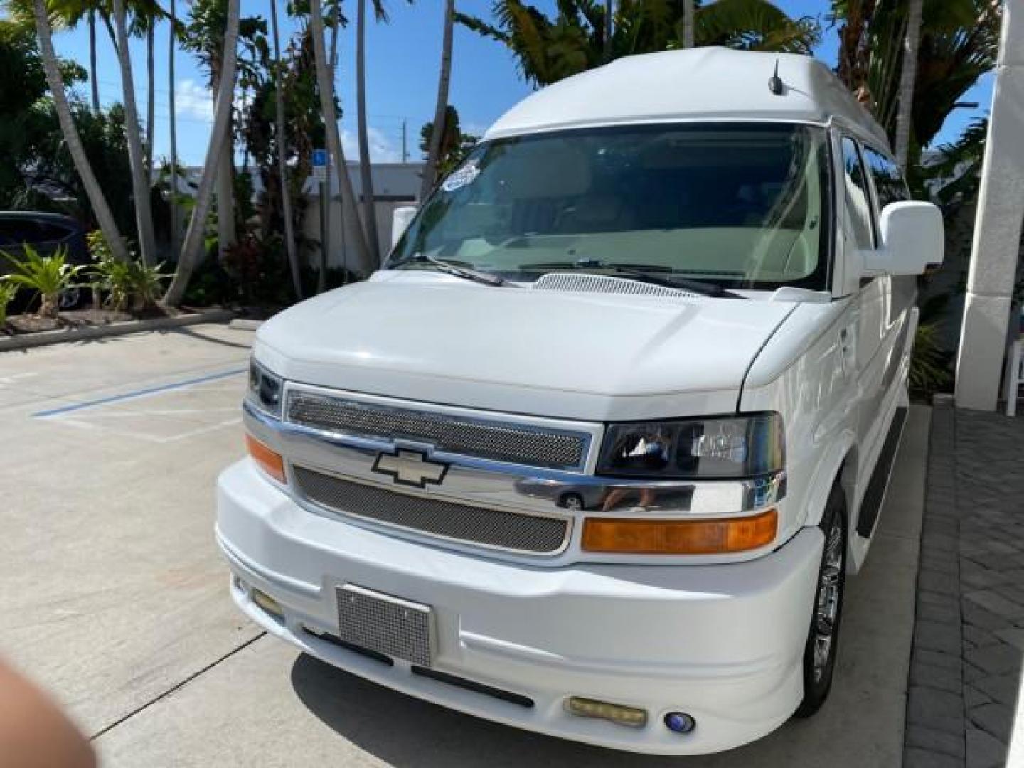 2012 Summit White /Neutral Chevrolet Express EXTENDED HIGH TOP CONVERSION 1 OWNER LOW MILES 36,054 (1GBWGLCG9C1) with an 6.0L Vortec 1000 V8 SFI Flex-Fuel Engine engine, Automatic transmission, located at 4701 North Dixie Hwy, Pompano Beach, FL, 33064, (954) 422-2889, 26.240938, -80.123474 - OUR WEBPAGE FLORIDACARS1.COM HAS OVER 100 PHOTOS AND FREE CARFAX LINK 2012 Chevrolet Express EXTENDED HIGH TOP CONVERSION VAN 1 OWNER Van 6.0L V8 F OHV 16V Flex Fuel 15 MPG Rear Wheel Drive Features ABS Brakes Air Conditioning Alloy Wheels AM/FM Stereo Automatic Transmission Auxiliary Audio Input Bl- Photo#3
