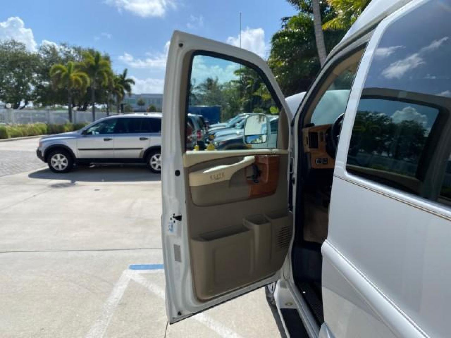 2012 Summit White /Neutral Chevrolet Express EXTENDED HIGH TOP CONVERSION 1 OWNER LOW MILES 36,054 (1GBWGLCG9C1) with an 6.0L Vortec 1000 V8 SFI Flex-Fuel Engine engine, Automatic transmission, located at 4701 North Dixie Hwy, Pompano Beach, FL, 33064, (954) 422-2889, 26.240938, -80.123474 - OUR WEBPAGE FLORIDACARS1.COM HAS OVER 100 PHOTOS AND FREE CARFAX LINK 2012 Chevrolet Express EXTENDED HIGH TOP CONVERSION VAN 1 OWNER Van 6.0L V8 F OHV 16V Flex Fuel 15 MPG Rear Wheel Drive Features ABS Brakes Air Conditioning Alloy Wheels AM/FM Stereo Automatic Transmission Auxiliary Audio Input Bl- Photo#9