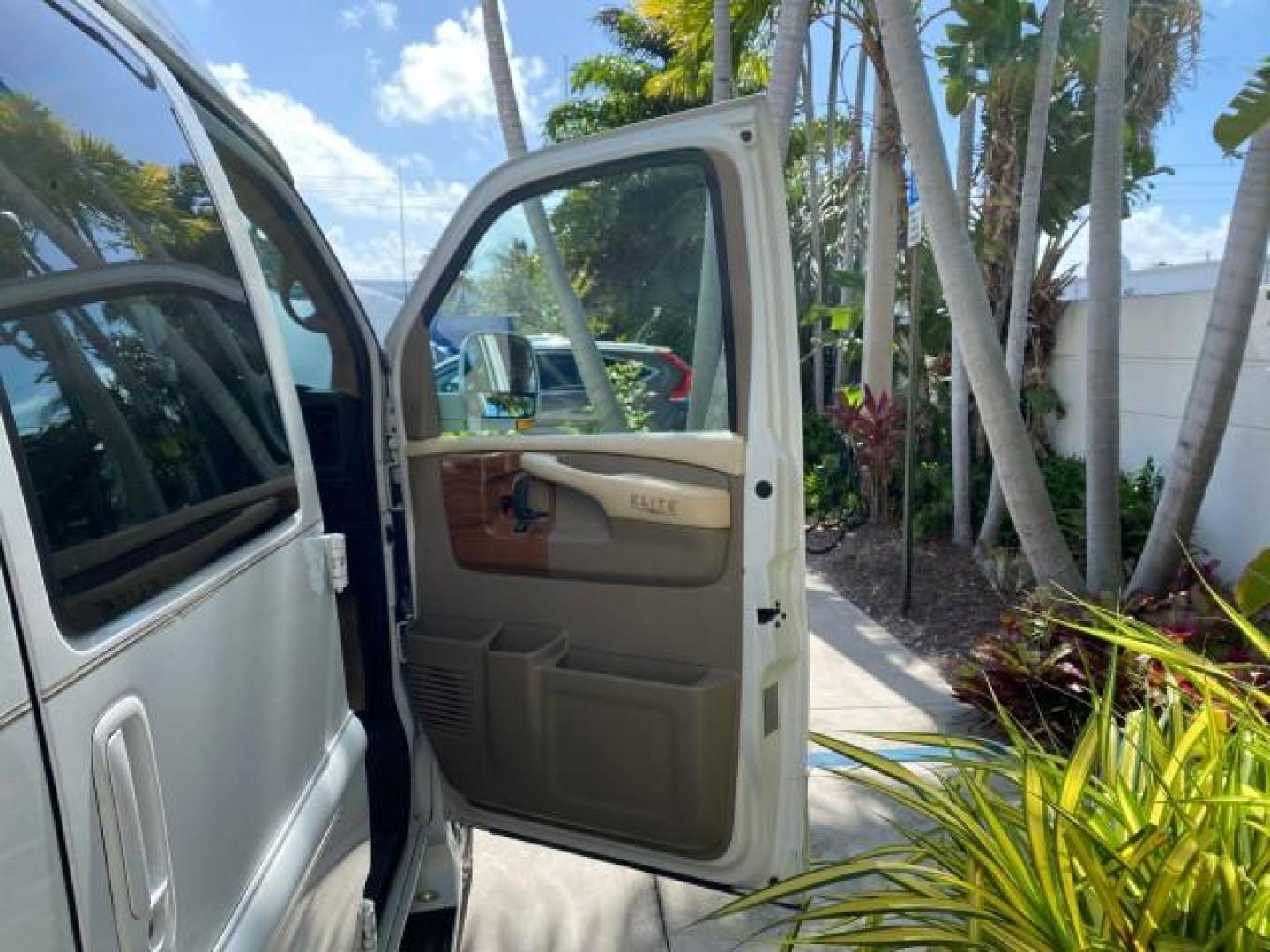 2012 Summit White /Neutral Chevrolet Express EXTENDED HIGH TOP CONVERSION 1 OWNER LOW MILES 36,054 (1GBWGLCG9C1) with an 6.0L Vortec 1000 V8 SFI Flex-Fuel Engine engine, Automatic transmission, located at 4701 North Dixie Hwy, Pompano Beach, FL, 33064, (954) 422-2889, 26.240938, -80.123474 - OUR WEBPAGE FLORIDACARS1.COM HAS OVER 100 PHOTOS AND FREE CARFAX LINK 2012 Chevrolet Express EXTENDED HIGH TOP CONVERSION VAN 1 OWNER Van 6.0L V8 F OHV 16V Flex Fuel 15 MPG Rear Wheel Drive Features ABS Brakes Air Conditioning Alloy Wheels AM/FM Stereo Automatic Transmission Auxiliary Audio Input Bl- Photo#11