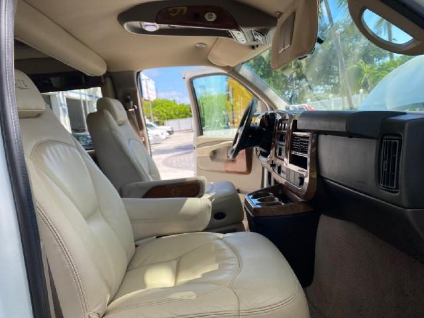 2012 Summit White /Neutral Chevrolet Express EXTENDED HIGH TOP CONVERSION 1 OWNER LOW MILES 36,054 (1GBWGLCG9C1) with an 6.0L Vortec 1000 V8 SFI Flex-Fuel Engine engine, Automatic transmission, located at 4701 North Dixie Hwy, Pompano Beach, FL, 33064, (954) 422-2889, 26.240938, -80.123474 - OUR WEBPAGE FLORIDACARS1.COM HAS OVER 100 PHOTOS AND FREE CARFAX LINK 2012 Chevrolet Express EXTENDED HIGH TOP CONVERSION VAN 1 OWNER Van 6.0L V8 F OHV 16V Flex Fuel 15 MPG Rear Wheel Drive Features ABS Brakes Air Conditioning Alloy Wheels AM/FM Stereo Automatic Transmission Auxiliary Audio Input Bl- Photo#12