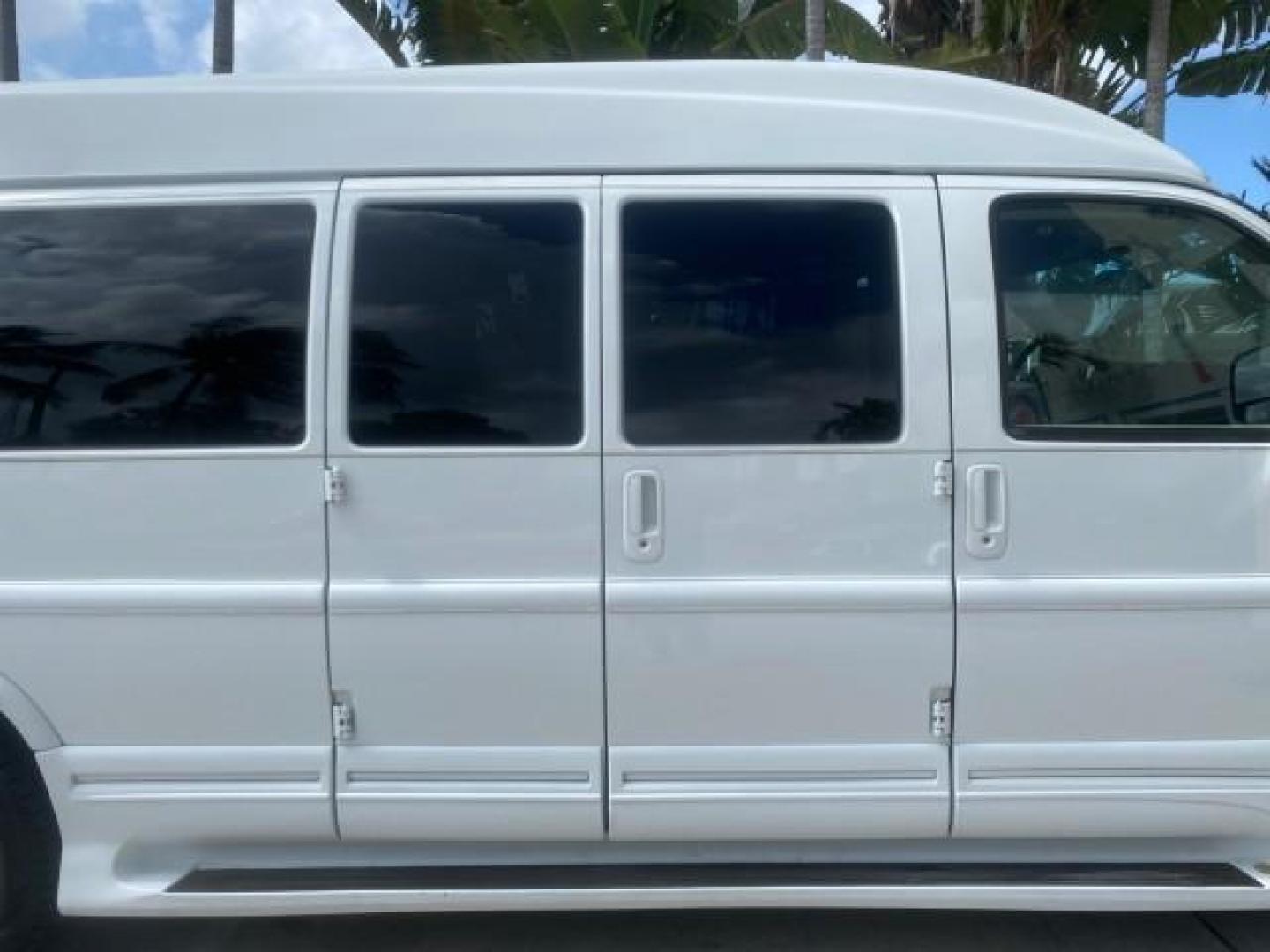 2012 Summit White /Neutral Chevrolet Express EXTENDED HIGH TOP CONVERSION 1 OWNER LOW MILES 36,054 (1GBWGLCG9C1) with an 6.0L Vortec 1000 V8 SFI Flex-Fuel Engine engine, Automatic transmission, located at 4701 North Dixie Hwy, Pompano Beach, FL, 33064, (954) 422-2889, 26.240938, -80.123474 - OUR WEBPAGE FLORIDACARS1.COM HAS OVER 100 PHOTOS AND FREE CARFAX LINK 2012 Chevrolet Express EXTENDED HIGH TOP CONVERSION VAN 1 OWNER Van 6.0L V8 F OHV 16V Flex Fuel 15 MPG Rear Wheel Drive Features ABS Brakes Air Conditioning Alloy Wheels AM/FM Stereo Automatic Transmission Auxiliary Audio Input Bl- Photo#13