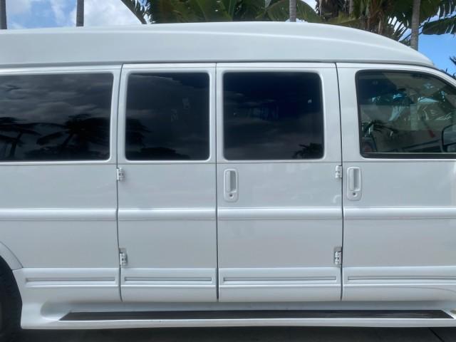2012 Summit White /Neutral Chevrolet Express EXTENDED HIGH TOP CONVERSION 1 OWNER LOW MILES 36,054 (1GBWGLCG9C1) with an 6.0L Vortec 1000 V8 SFI Flex-Fuel Engine engine, Automatic transmission, located at 4701 North Dixie Hwy, Pompano Beach, FL, 33064, (954) 422-2889, 26.240938, -80.123474 - OUR WEBPAGE FLORIDACARS1.COM HAS OVER 100 PHOTOS AND FREE CARFAX LINK 2012 Chevrolet Express EXTENDED HIGH TOP CONVERSION VAN 1 OWNER Van 6.0L V8 F OHV 16V Flex Fuel 15 MPG Rear Wheel Drive Features ABS Brakes Air Conditioning Alloy Wheels AM/FM Stereo Automatic Transmission Auxiliary Audio Input Bl - Photo#13
