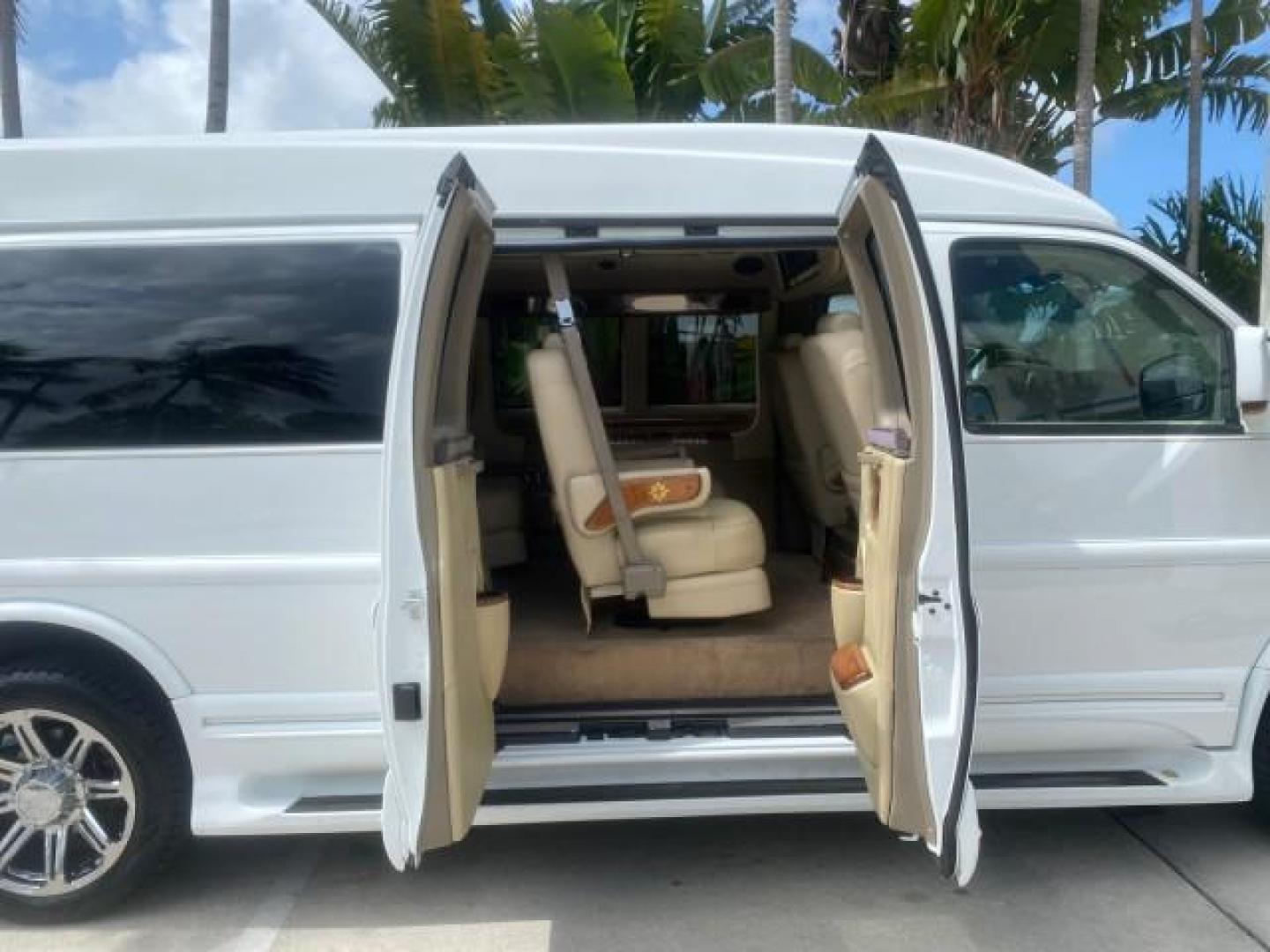 2012 Summit White /Neutral Chevrolet Express EXTENDED HIGH TOP CONVERSION 1 OWNER LOW MILES 36,054 (1GBWGLCG9C1) with an 6.0L Vortec 1000 V8 SFI Flex-Fuel Engine engine, Automatic transmission, located at 4701 North Dixie Hwy, Pompano Beach, FL, 33064, (954) 422-2889, 26.240938, -80.123474 - OUR WEBPAGE FLORIDACARS1.COM HAS OVER 100 PHOTOS AND FREE CARFAX LINK 2012 Chevrolet Express EXTENDED HIGH TOP CONVERSION VAN 1 OWNER Van 6.0L V8 F OHV 16V Flex Fuel 15 MPG Rear Wheel Drive Features ABS Brakes Air Conditioning Alloy Wheels AM/FM Stereo Automatic Transmission Auxiliary Audio Input Bl- Photo#14