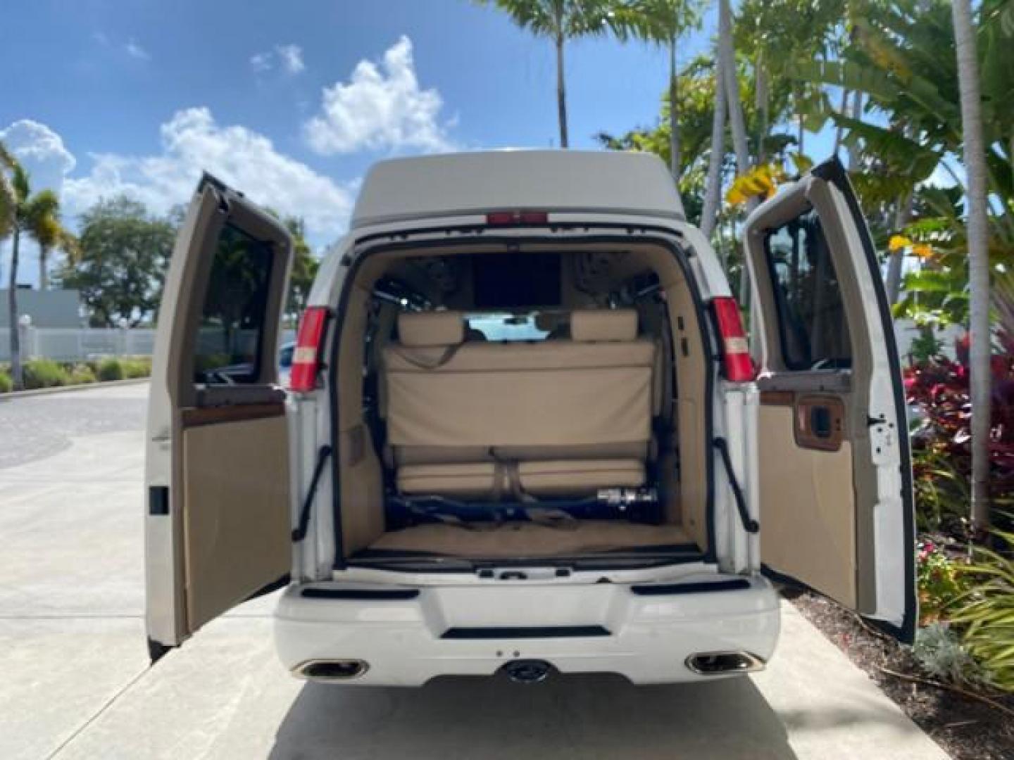 2012 Summit White /Neutral Chevrolet Express EXTENDED HIGH TOP CONVERSION 1 OWNER LOW MILES 36,054 (1GBWGLCG9C1) with an 6.0L Vortec 1000 V8 SFI Flex-Fuel Engine engine, Automatic transmission, located at 4701 North Dixie Hwy, Pompano Beach, FL, 33064, (954) 422-2889, 26.240938, -80.123474 - OUR WEBPAGE FLORIDACARS1.COM HAS OVER 100 PHOTOS AND FREE CARFAX LINK 2012 Chevrolet Express EXTENDED HIGH TOP CONVERSION VAN 1 OWNER Van 6.0L V8 F OHV 16V Flex Fuel 15 MPG Rear Wheel Drive Features ABS Brakes Air Conditioning Alloy Wheels AM/FM Stereo Automatic Transmission Auxiliary Audio Input Bl- Photo#15