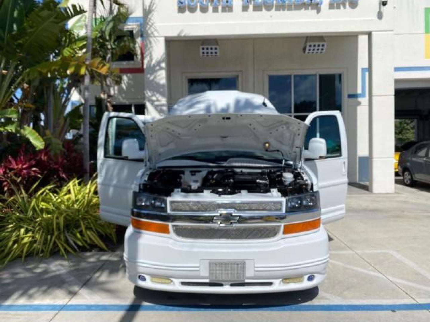 2012 Summit White /Neutral Chevrolet Express EXTENDED HIGH TOP CONVERSION 1 OWNER LOW MILES 36,054 (1GBWGLCG9C1) with an 6.0L Vortec 1000 V8 SFI Flex-Fuel Engine engine, Automatic transmission, located at 4701 North Dixie Hwy, Pompano Beach, FL, 33064, (954) 422-2889, 26.240938, -80.123474 - OUR WEBPAGE FLORIDACARS1.COM HAS OVER 100 PHOTOS AND FREE CARFAX LINK 2012 Chevrolet Express EXTENDED HIGH TOP CONVERSION VAN 1 OWNER Van 6.0L V8 F OHV 16V Flex Fuel 15 MPG Rear Wheel Drive Features ABS Brakes Air Conditioning Alloy Wheels AM/FM Stereo Automatic Transmission Auxiliary Audio Input Bl- Photo#16