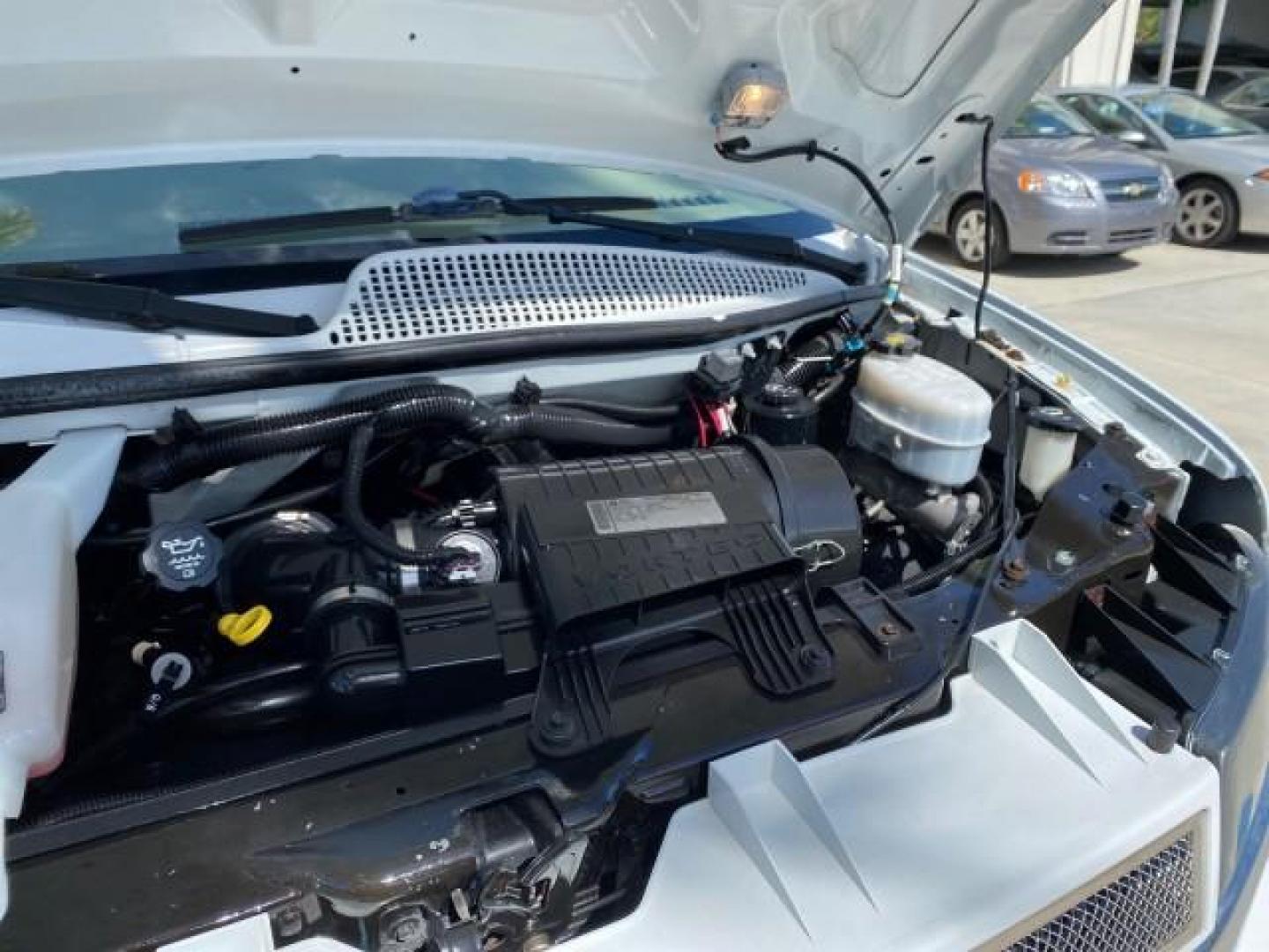 2012 Summit White /Neutral Chevrolet Express EXTENDED HIGH TOP CONVERSION 1 OWNER LOW MILES 36,054 (1GBWGLCG9C1) with an 6.0L Vortec 1000 V8 SFI Flex-Fuel Engine engine, Automatic transmission, located at 4701 North Dixie Hwy, Pompano Beach, FL, 33064, (954) 422-2889, 26.240938, -80.123474 - OUR WEBPAGE FLORIDACARS1.COM HAS OVER 100 PHOTOS AND FREE CARFAX LINK 2012 Chevrolet Express EXTENDED HIGH TOP CONVERSION VAN 1 OWNER Van 6.0L V8 F OHV 16V Flex Fuel 15 MPG Rear Wheel Drive Features ABS Brakes Air Conditioning Alloy Wheels AM/FM Stereo Automatic Transmission Auxiliary Audio Input Bl- Photo#25