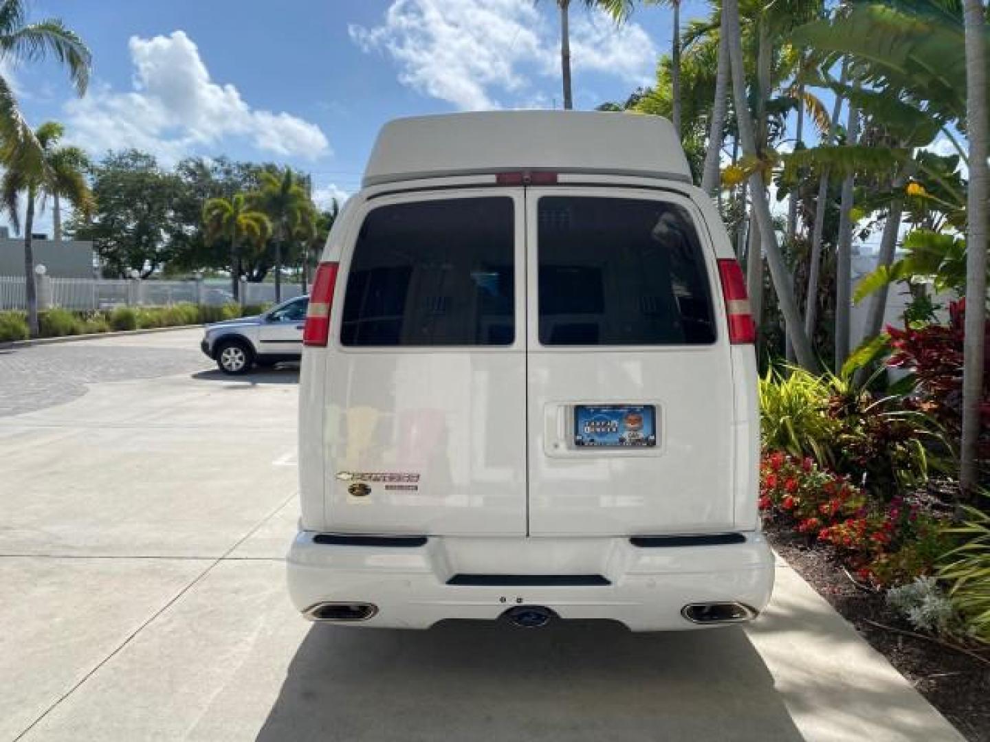 2012 Summit White /Neutral Chevrolet Express EXTENDED HIGH TOP CONVERSION 1 OWNER LOW MILES 36,054 (1GBWGLCG9C1) with an 6.0L Vortec 1000 V8 SFI Flex-Fuel Engine engine, Automatic transmission, located at 4701 North Dixie Hwy, Pompano Beach, FL, 33064, (954) 422-2889, 26.240938, -80.123474 - OUR WEBPAGE FLORIDACARS1.COM HAS OVER 100 PHOTOS AND FREE CARFAX LINK 2012 Chevrolet Express EXTENDED HIGH TOP CONVERSION VAN 1 OWNER Van 6.0L V8 F OHV 16V Flex Fuel 15 MPG Rear Wheel Drive Features ABS Brakes Air Conditioning Alloy Wheels AM/FM Stereo Automatic Transmission Auxiliary Audio Input Bl- Photo#34