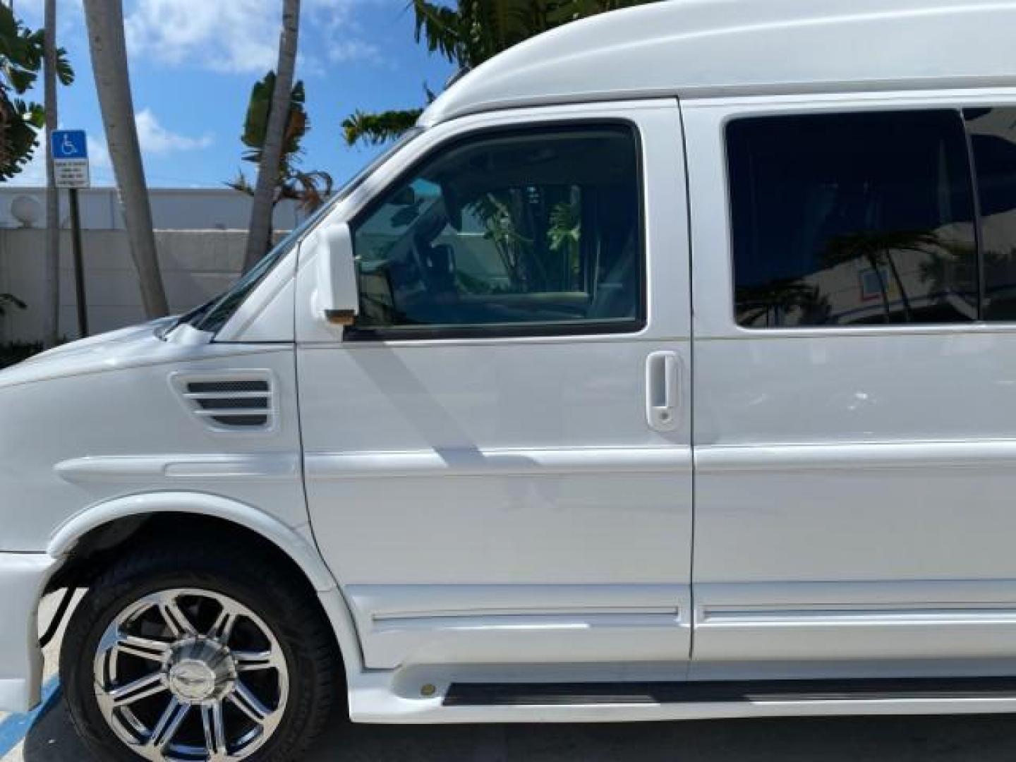 2012 Summit White /Neutral Chevrolet Express EXTENDED HIGH TOP CONVERSION 1 OWNER LOW MILES 36,054 (1GBWGLCG9C1) with an 6.0L Vortec 1000 V8 SFI Flex-Fuel Engine engine, Automatic transmission, located at 4701 North Dixie Hwy, Pompano Beach, FL, 33064, (954) 422-2889, 26.240938, -80.123474 - OUR WEBPAGE FLORIDACARS1.COM HAS OVER 100 PHOTOS AND FREE CARFAX LINK 2012 Chevrolet Express EXTENDED HIGH TOP CONVERSION VAN 1 OWNER Van 6.0L V8 F OHV 16V Flex Fuel 15 MPG Rear Wheel Drive Features ABS Brakes Air Conditioning Alloy Wheels AM/FM Stereo Automatic Transmission Auxiliary Audio Input Bl- Photo#37