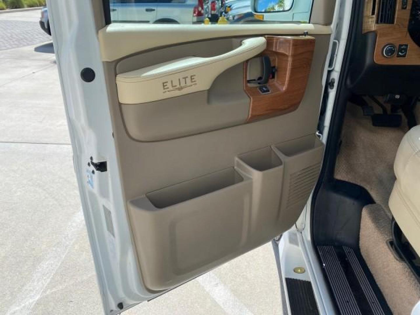 2012 Summit White /Neutral Chevrolet Express EXTENDED HIGH TOP CONVERSION 1 OWNER LOW MILES 36,054 (1GBWGLCG9C1) with an 6.0L Vortec 1000 V8 SFI Flex-Fuel Engine engine, Automatic transmission, located at 4701 North Dixie Hwy, Pompano Beach, FL, 33064, (954) 422-2889, 26.240938, -80.123474 - OUR WEBPAGE FLORIDACARS1.COM HAS OVER 100 PHOTOS AND FREE CARFAX LINK 2012 Chevrolet Express EXTENDED HIGH TOP CONVERSION VAN 1 OWNER Van 6.0L V8 F OHV 16V Flex Fuel 15 MPG Rear Wheel Drive Features ABS Brakes Air Conditioning Alloy Wheels AM/FM Stereo Automatic Transmission Auxiliary Audio Input Bl- Photo#42