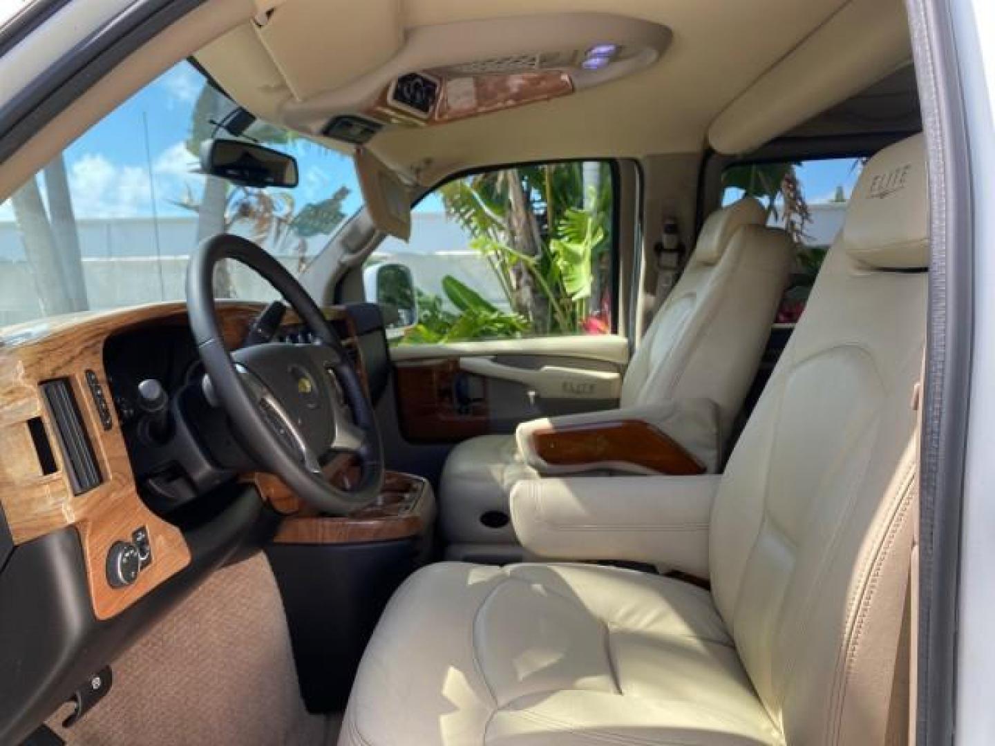 2012 Summit White /Neutral Chevrolet Express EXTENDED HIGH TOP CONVERSION 1 OWNER LOW MILES 36,054 (1GBWGLCG9C1) with an 6.0L Vortec 1000 V8 SFI Flex-Fuel Engine engine, Automatic transmission, located at 4701 North Dixie Hwy, Pompano Beach, FL, 33064, (954) 422-2889, 26.240938, -80.123474 - OUR WEBPAGE FLORIDACARS1.COM HAS OVER 100 PHOTOS AND FREE CARFAX LINK 2012 Chevrolet Express EXTENDED HIGH TOP CONVERSION VAN 1 OWNER Van 6.0L V8 F OHV 16V Flex Fuel 15 MPG Rear Wheel Drive Features ABS Brakes Air Conditioning Alloy Wheels AM/FM Stereo Automatic Transmission Auxiliary Audio Input Bl- Photo#45