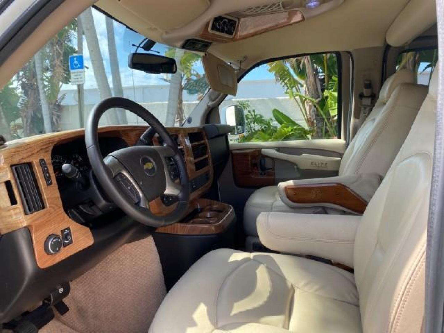 2012 Summit White /Neutral Chevrolet Express EXTENDED HIGH TOP CONVERSION 1 OWNER LOW MILES 36,054 (1GBWGLCG9C1) with an 6.0L Vortec 1000 V8 SFI Flex-Fuel Engine engine, Automatic transmission, located at 4701 North Dixie Hwy, Pompano Beach, FL, 33064, (954) 422-2889, 26.240938, -80.123474 - OUR WEBPAGE FLORIDACARS1.COM HAS OVER 100 PHOTOS AND FREE CARFAX LINK 2012 Chevrolet Express EXTENDED HIGH TOP CONVERSION VAN 1 OWNER Van 6.0L V8 F OHV 16V Flex Fuel 15 MPG Rear Wheel Drive Features ABS Brakes Air Conditioning Alloy Wheels AM/FM Stereo Automatic Transmission Auxiliary Audio Input Bl- Photo#46
