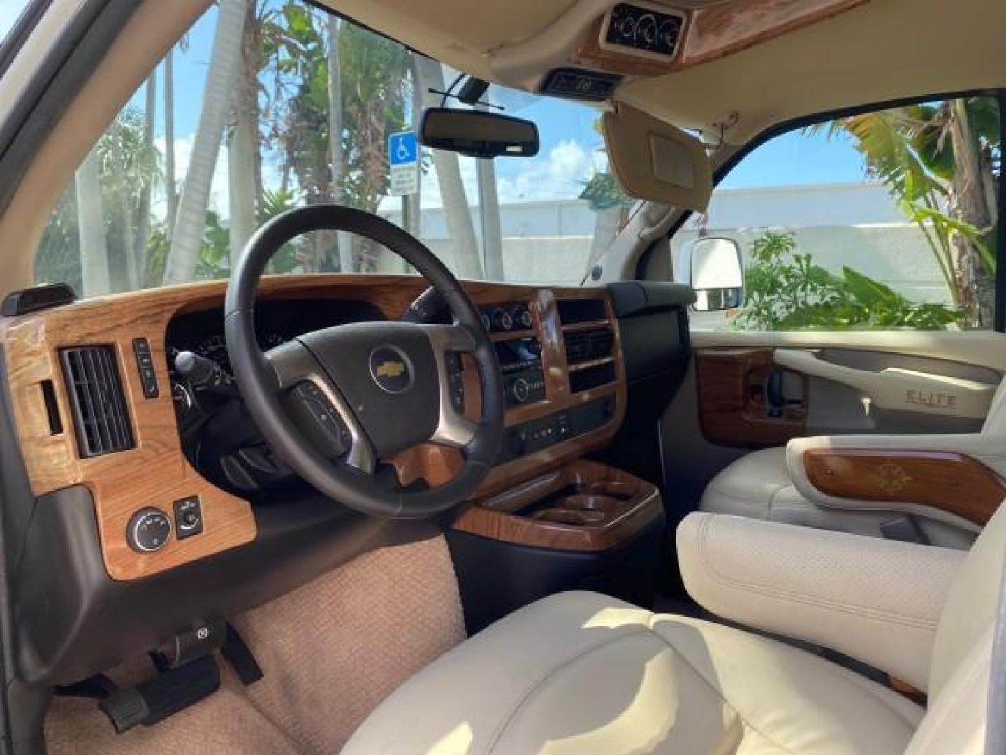2012 Summit White /Neutral Chevrolet Express EXTENDED HIGH TOP CONVERSION 1 OWNER LOW MILES 36,054 (1GBWGLCG9C1) with an 6.0L Vortec 1000 V8 SFI Flex-Fuel Engine engine, Automatic transmission, located at 4701 North Dixie Hwy, Pompano Beach, FL, 33064, (954) 422-2889, 26.240938, -80.123474 - OUR WEBPAGE FLORIDACARS1.COM HAS OVER 100 PHOTOS AND FREE CARFAX LINK 2012 Chevrolet Express EXTENDED HIGH TOP CONVERSION VAN 1 OWNER Van 6.0L V8 F OHV 16V Flex Fuel 15 MPG Rear Wheel Drive Features ABS Brakes Air Conditioning Alloy Wheels AM/FM Stereo Automatic Transmission Auxiliary Audio Input Bl- Photo#47
