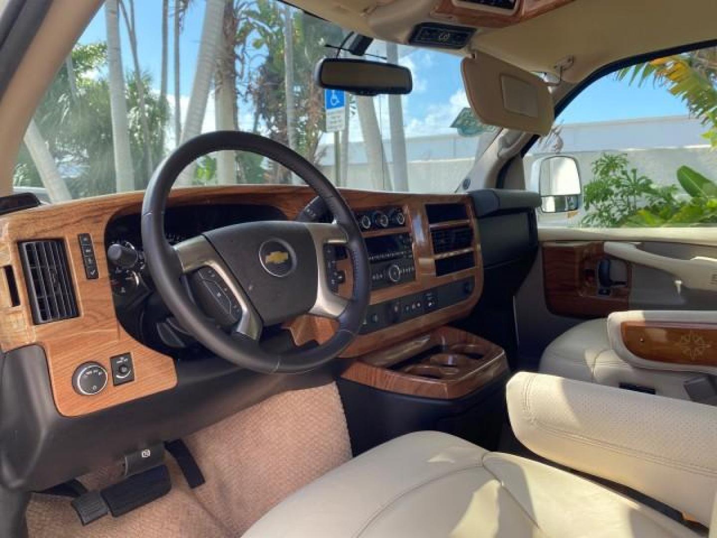 2012 Summit White /Neutral Chevrolet Express EXTENDED HIGH TOP CONVERSION 1 OWNER LOW MILES 36,054 (1GBWGLCG9C1) with an 6.0L Vortec 1000 V8 SFI Flex-Fuel Engine engine, Automatic transmission, located at 4701 North Dixie Hwy, Pompano Beach, FL, 33064, (954) 422-2889, 26.240938, -80.123474 - OUR WEBPAGE FLORIDACARS1.COM HAS OVER 100 PHOTOS AND FREE CARFAX LINK 2012 Chevrolet Express EXTENDED HIGH TOP CONVERSION VAN 1 OWNER Van 6.0L V8 F OHV 16V Flex Fuel 15 MPG Rear Wheel Drive Features ABS Brakes Air Conditioning Alloy Wheels AM/FM Stereo Automatic Transmission Auxiliary Audio Input Bl- Photo#48