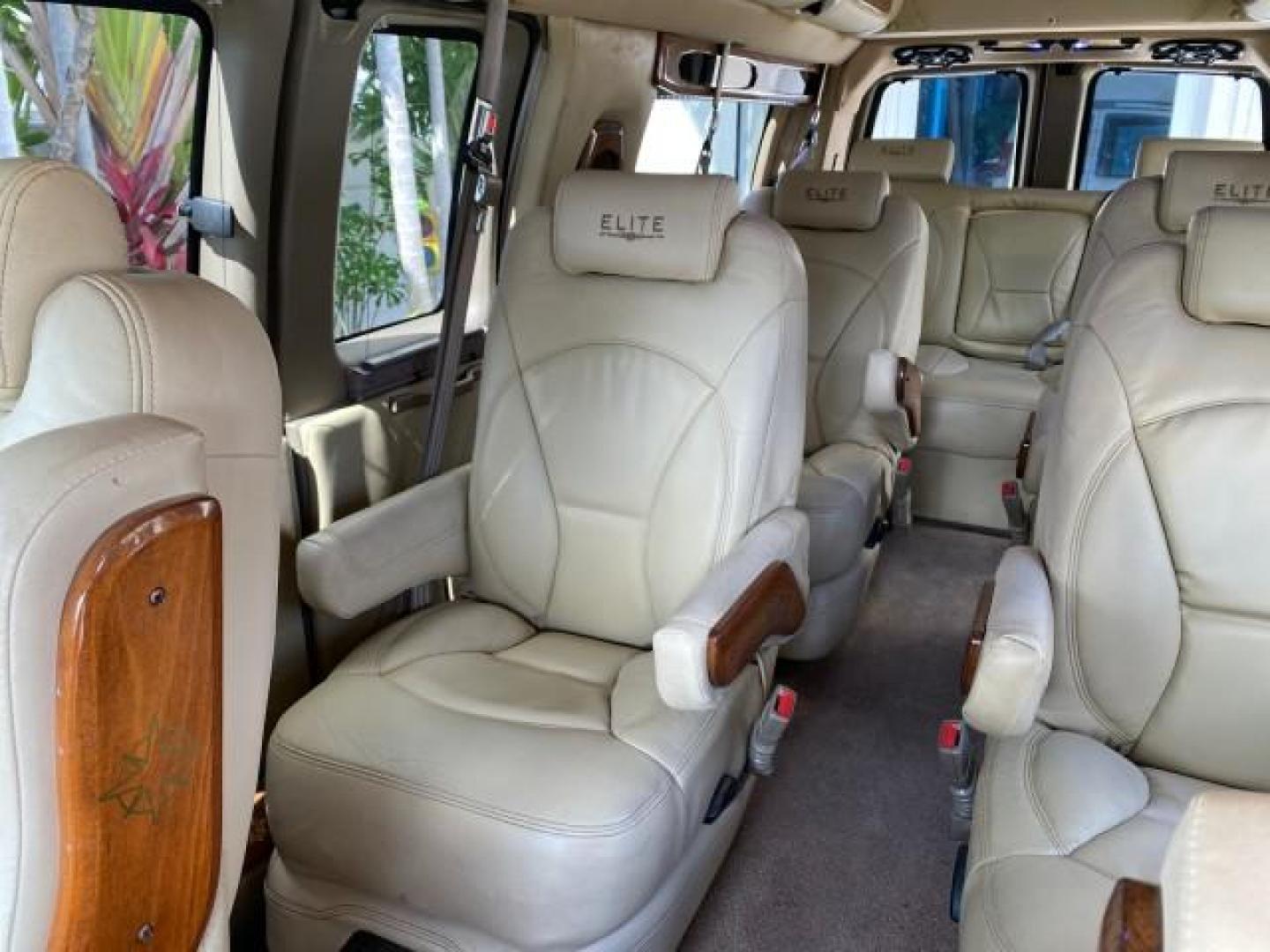 2012 Summit White /Neutral Chevrolet Express EXTENDED HIGH TOP CONVERSION 1 OWNER LOW MILES 36,054 (1GBWGLCG9C1) with an 6.0L Vortec 1000 V8 SFI Flex-Fuel Engine engine, Automatic transmission, located at 4701 North Dixie Hwy, Pompano Beach, FL, 33064, (954) 422-2889, 26.240938, -80.123474 - OUR WEBPAGE FLORIDACARS1.COM HAS OVER 100 PHOTOS AND FREE CARFAX LINK 2012 Chevrolet Express EXTENDED HIGH TOP CONVERSION VAN 1 OWNER Van 6.0L V8 F OHV 16V Flex Fuel 15 MPG Rear Wheel Drive Features ABS Brakes Air Conditioning Alloy Wheels AM/FM Stereo Automatic Transmission Auxiliary Audio Input Bl- Photo#71