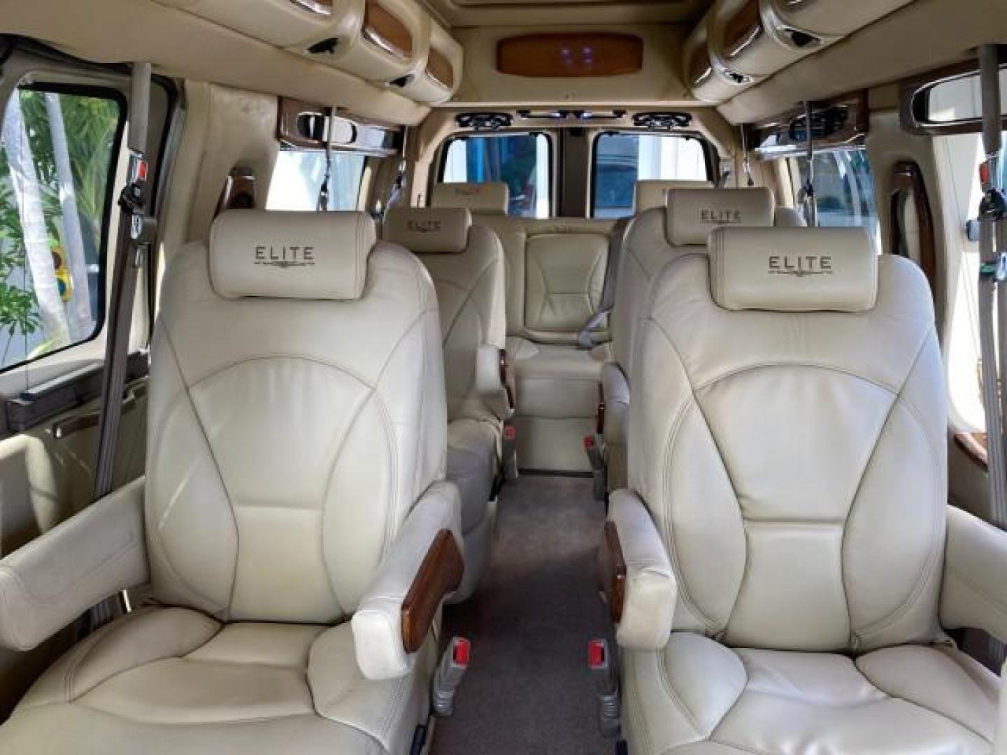 2012 Summit White /Neutral Chevrolet Express EXTENDED HIGH TOP CONVERSION 1 OWNER LOW MILES 36,054 (1GBWGLCG9C1) with an 6.0L Vortec 1000 V8 SFI Flex-Fuel Engine engine, Automatic transmission, located at 4701 North Dixie Hwy, Pompano Beach, FL, 33064, (954) 422-2889, 26.240938, -80.123474 - OUR WEBPAGE FLORIDACARS1.COM HAS OVER 100 PHOTOS AND FREE CARFAX LINK 2012 Chevrolet Express EXTENDED HIGH TOP CONVERSION VAN 1 OWNER Van 6.0L V8 F OHV 16V Flex Fuel 15 MPG Rear Wheel Drive Features ABS Brakes Air Conditioning Alloy Wheels AM/FM Stereo Automatic Transmission Auxiliary Audio Input Bl- Photo#72