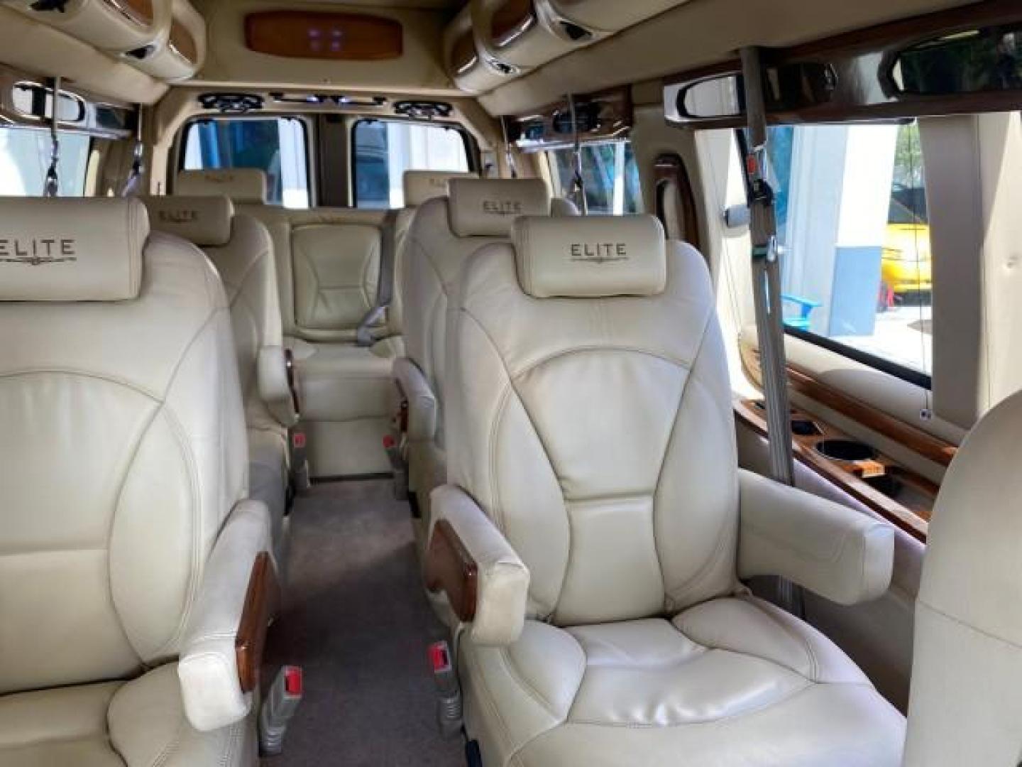2012 Summit White /Neutral Chevrolet Express EXTENDED HIGH TOP CONVERSION 1 OWNER LOW MILES 36,054 (1GBWGLCG9C1) with an 6.0L Vortec 1000 V8 SFI Flex-Fuel Engine engine, Automatic transmission, located at 4701 North Dixie Hwy, Pompano Beach, FL, 33064, (954) 422-2889, 26.240938, -80.123474 - OUR WEBPAGE FLORIDACARS1.COM HAS OVER 100 PHOTOS AND FREE CARFAX LINK 2012 Chevrolet Express EXTENDED HIGH TOP CONVERSION VAN 1 OWNER Van 6.0L V8 F OHV 16V Flex Fuel 15 MPG Rear Wheel Drive Features ABS Brakes Air Conditioning Alloy Wheels AM/FM Stereo Automatic Transmission Auxiliary Audio Input Bl- Photo#73