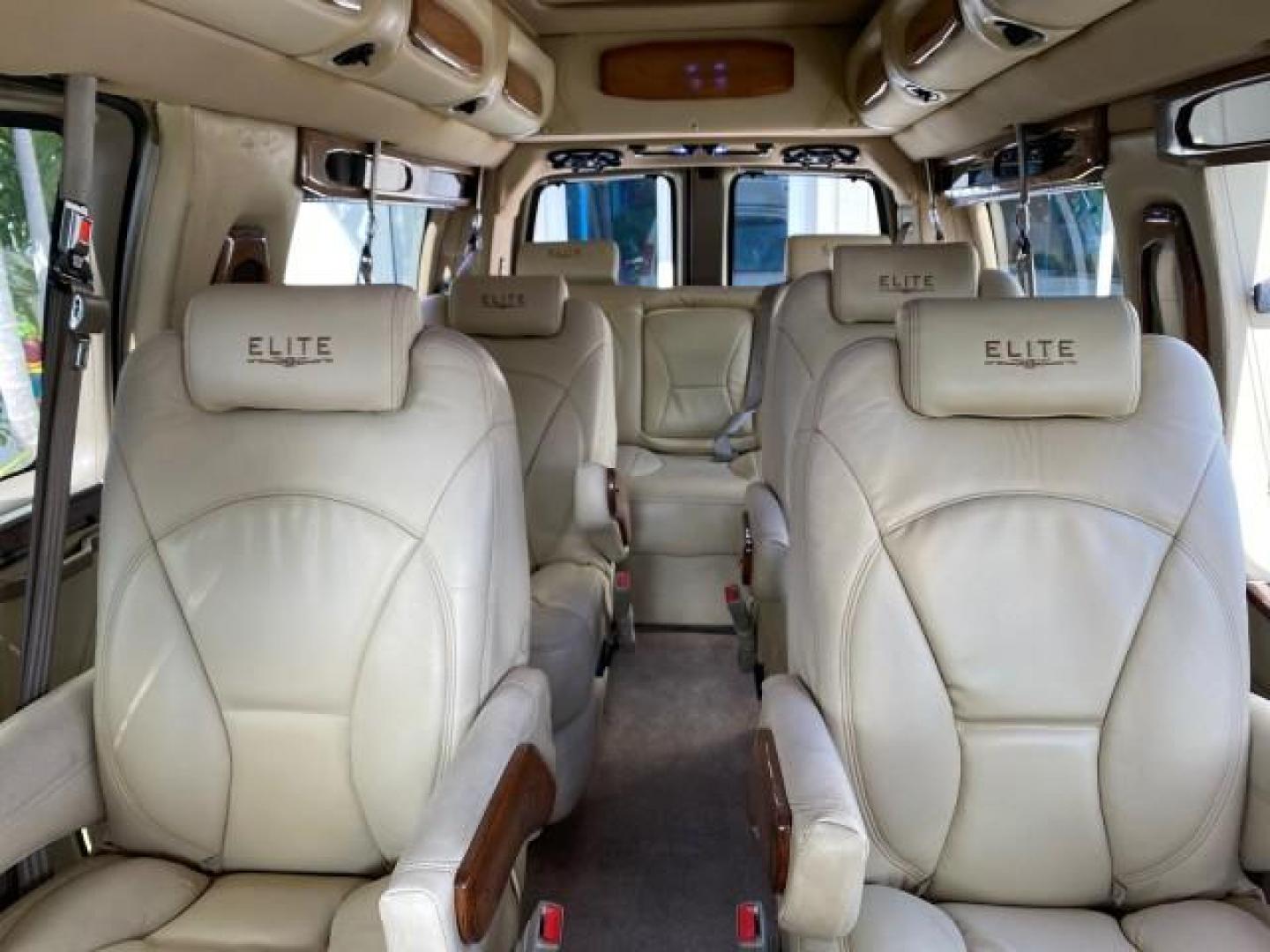 2012 Summit White /Neutral Chevrolet Express EXTENDED HIGH TOP CONVERSION 1 OWNER LOW MILES 36,054 (1GBWGLCG9C1) with an 6.0L Vortec 1000 V8 SFI Flex-Fuel Engine engine, Automatic transmission, located at 4701 North Dixie Hwy, Pompano Beach, FL, 33064, (954) 422-2889, 26.240938, -80.123474 - OUR WEBPAGE FLORIDACARS1.COM HAS OVER 100 PHOTOS AND FREE CARFAX LINK 2012 Chevrolet Express EXTENDED HIGH TOP CONVERSION VAN 1 OWNER Van 6.0L V8 F OHV 16V Flex Fuel 15 MPG Rear Wheel Drive Features ABS Brakes Air Conditioning Alloy Wheels AM/FM Stereo Automatic Transmission Auxiliary Audio Input Bl- Photo#74