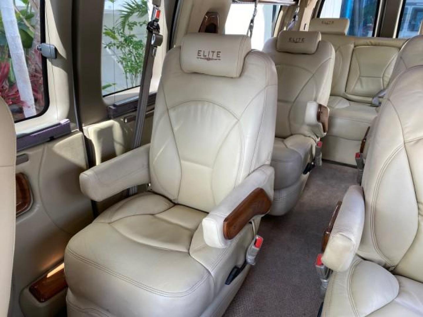 2012 Summit White /Neutral Chevrolet Express EXTENDED HIGH TOP CONVERSION 1 OWNER LOW MILES 36,054 (1GBWGLCG9C1) with an 6.0L Vortec 1000 V8 SFI Flex-Fuel Engine engine, Automatic transmission, located at 4701 North Dixie Hwy, Pompano Beach, FL, 33064, (954) 422-2889, 26.240938, -80.123474 - OUR WEBPAGE FLORIDACARS1.COM HAS OVER 100 PHOTOS AND FREE CARFAX LINK 2012 Chevrolet Express EXTENDED HIGH TOP CONVERSION VAN 1 OWNER Van 6.0L V8 F OHV 16V Flex Fuel 15 MPG Rear Wheel Drive Features ABS Brakes Air Conditioning Alloy Wheels AM/FM Stereo Automatic Transmission Auxiliary Audio Input Bl- Photo#75