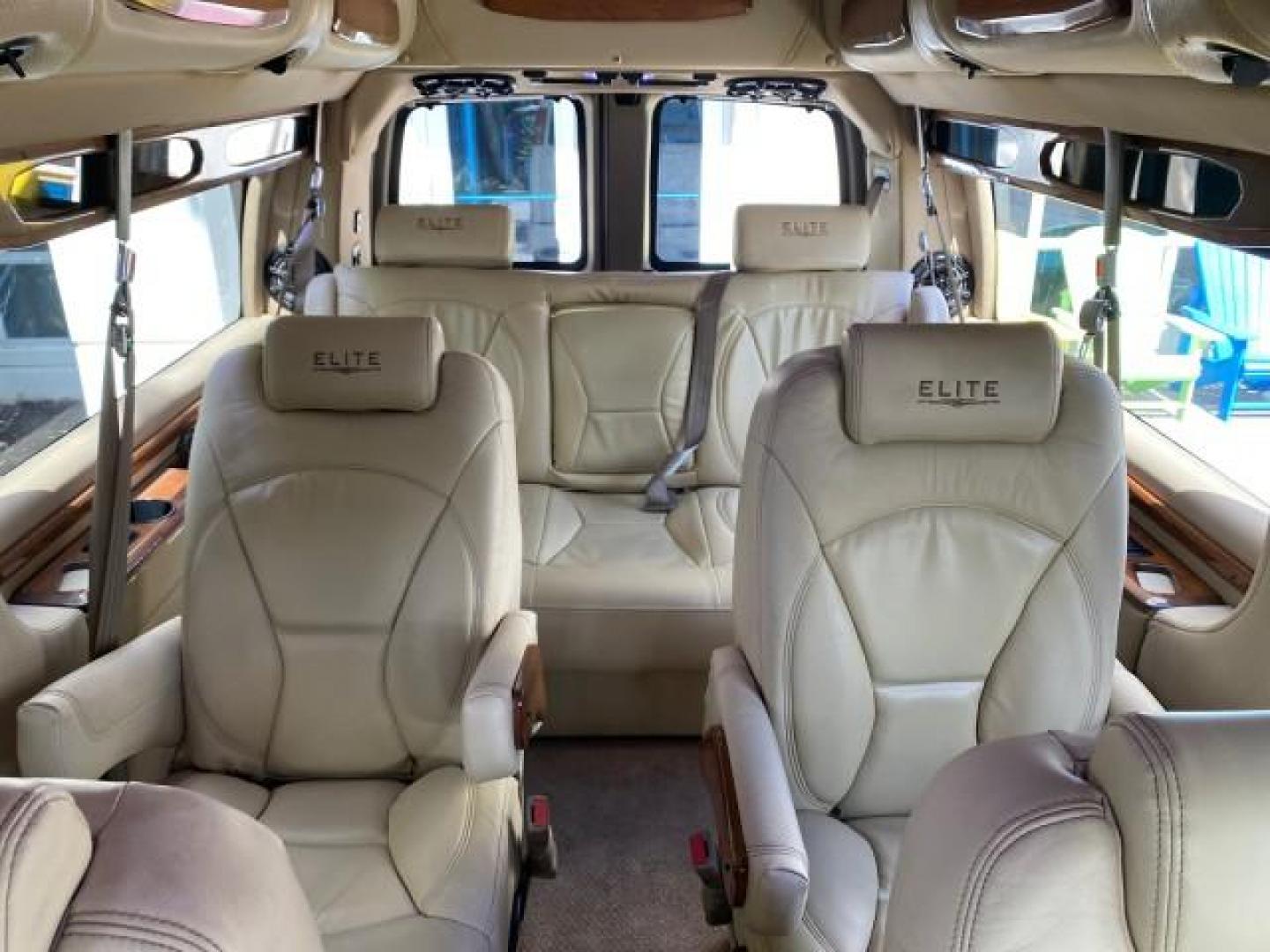 2012 Summit White /Neutral Chevrolet Express EXTENDED HIGH TOP CONVERSION 1 OWNER LOW MILES 36,054 (1GBWGLCG9C1) with an 6.0L Vortec 1000 V8 SFI Flex-Fuel Engine engine, Automatic transmission, located at 4701 North Dixie Hwy, Pompano Beach, FL, 33064, (954) 422-2889, 26.240938, -80.123474 - OUR WEBPAGE FLORIDACARS1.COM HAS OVER 100 PHOTOS AND FREE CARFAX LINK 2012 Chevrolet Express EXTENDED HIGH TOP CONVERSION VAN 1 OWNER Van 6.0L V8 F OHV 16V Flex Fuel 15 MPG Rear Wheel Drive Features ABS Brakes Air Conditioning Alloy Wheels AM/FM Stereo Automatic Transmission Auxiliary Audio Input Bl- Photo#76