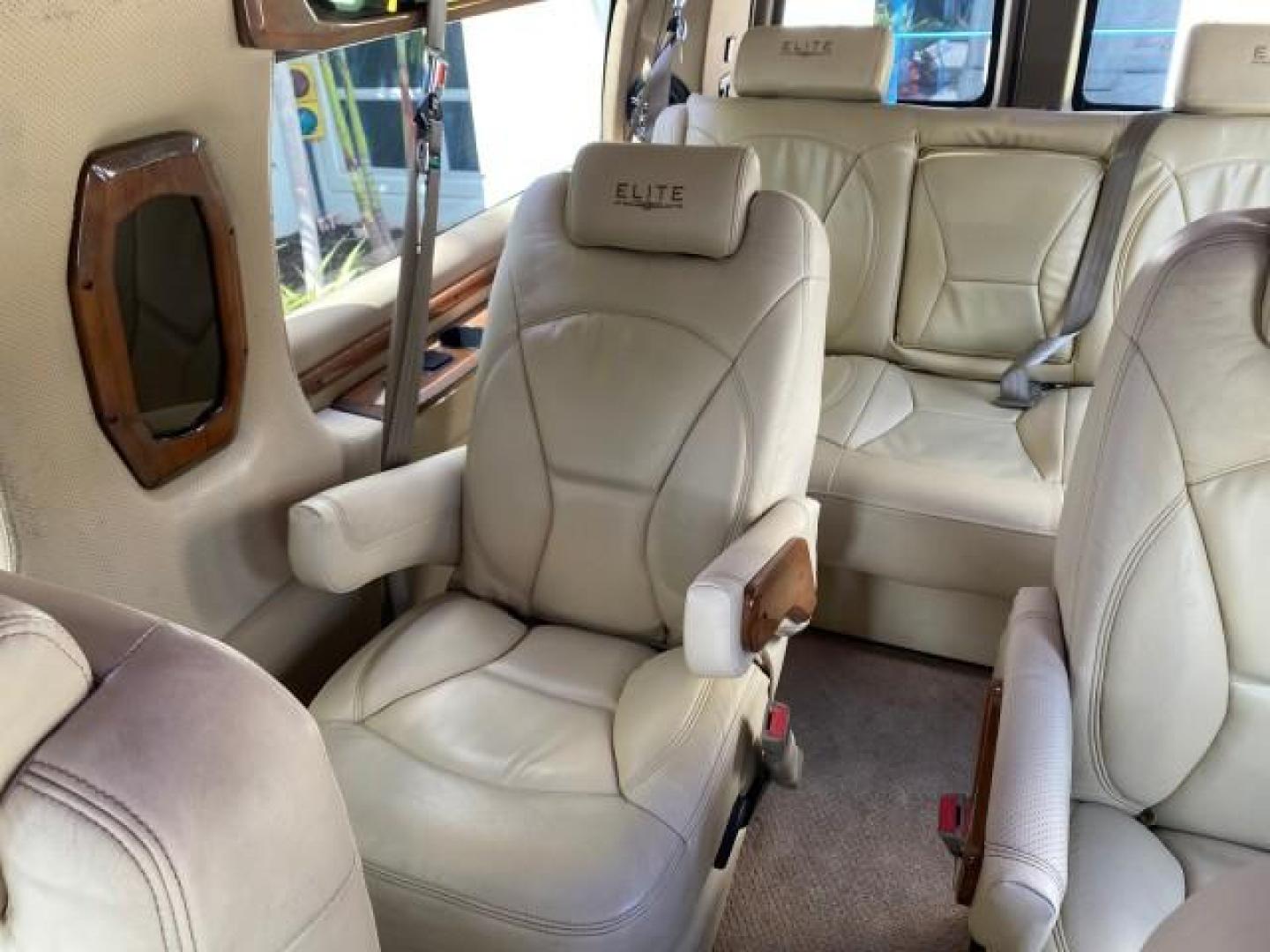 2012 Summit White /Neutral Chevrolet Express EXTENDED HIGH TOP CONVERSION 1 OWNER LOW MILES 36,054 (1GBWGLCG9C1) with an 6.0L Vortec 1000 V8 SFI Flex-Fuel Engine engine, Automatic transmission, located at 4701 North Dixie Hwy, Pompano Beach, FL, 33064, (954) 422-2889, 26.240938, -80.123474 - OUR WEBPAGE FLORIDACARS1.COM HAS OVER 100 PHOTOS AND FREE CARFAX LINK 2012 Chevrolet Express EXTENDED HIGH TOP CONVERSION VAN 1 OWNER Van 6.0L V8 F OHV 16V Flex Fuel 15 MPG Rear Wheel Drive Features ABS Brakes Air Conditioning Alloy Wheels AM/FM Stereo Automatic Transmission Auxiliary Audio Input Bl- Photo#77