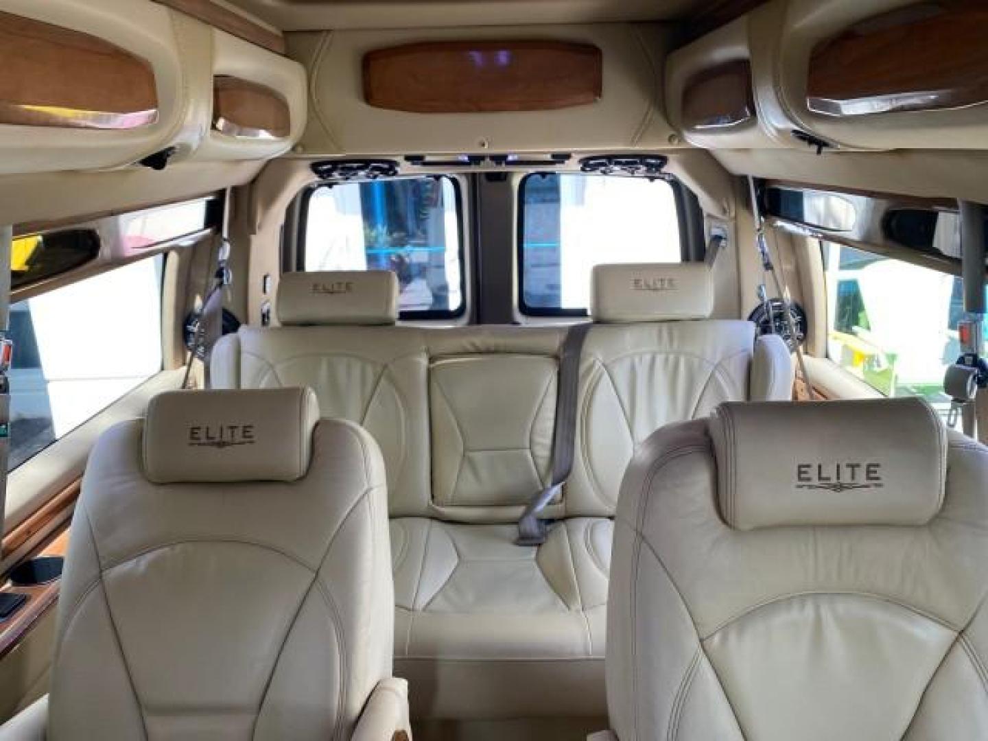 2012 Summit White /Neutral Chevrolet Express EXTENDED HIGH TOP CONVERSION 1 OWNER LOW MILES 36,054 (1GBWGLCG9C1) with an 6.0L Vortec 1000 V8 SFI Flex-Fuel Engine engine, Automatic transmission, located at 4701 North Dixie Hwy, Pompano Beach, FL, 33064, (954) 422-2889, 26.240938, -80.123474 - OUR WEBPAGE FLORIDACARS1.COM HAS OVER 100 PHOTOS AND FREE CARFAX LINK 2012 Chevrolet Express EXTENDED HIGH TOP CONVERSION VAN 1 OWNER Van 6.0L V8 F OHV 16V Flex Fuel 15 MPG Rear Wheel Drive Features ABS Brakes Air Conditioning Alloy Wheels AM/FM Stereo Automatic Transmission Auxiliary Audio Input Bl- Photo#79