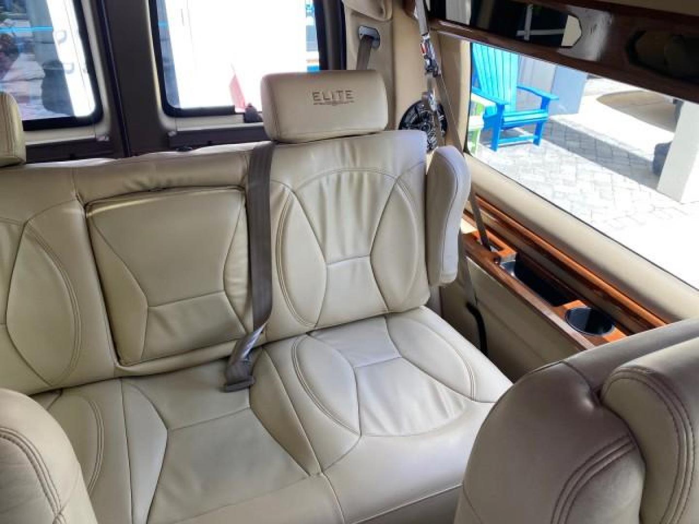 2012 Summit White /Neutral Chevrolet Express EXTENDED HIGH TOP CONVERSION 1 OWNER LOW MILES 36,054 (1GBWGLCG9C1) with an 6.0L Vortec 1000 V8 SFI Flex-Fuel Engine engine, Automatic transmission, located at 4701 North Dixie Hwy, Pompano Beach, FL, 33064, (954) 422-2889, 26.240938, -80.123474 - OUR WEBPAGE FLORIDACARS1.COM HAS OVER 100 PHOTOS AND FREE CARFAX LINK 2012 Chevrolet Express EXTENDED HIGH TOP CONVERSION VAN 1 OWNER Van 6.0L V8 F OHV 16V Flex Fuel 15 MPG Rear Wheel Drive Features ABS Brakes Air Conditioning Alloy Wheels AM/FM Stereo Automatic Transmission Auxiliary Audio Input Bl- Photo#80