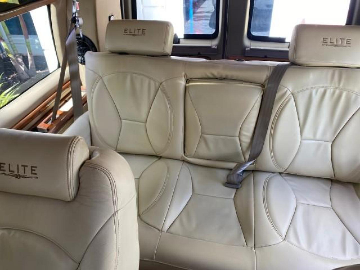 2012 Summit White /Neutral Chevrolet Express EXTENDED HIGH TOP CONVERSION 1 OWNER LOW MILES 36,054 (1GBWGLCG9C1) with an 6.0L Vortec 1000 V8 SFI Flex-Fuel Engine engine, Automatic transmission, located at 4701 North Dixie Hwy, Pompano Beach, FL, 33064, (954) 422-2889, 26.240938, -80.123474 - OUR WEBPAGE FLORIDACARS1.COM HAS OVER 100 PHOTOS AND FREE CARFAX LINK 2012 Chevrolet Express EXTENDED HIGH TOP CONVERSION VAN 1 OWNER Van 6.0L V8 F OHV 16V Flex Fuel 15 MPG Rear Wheel Drive Features ABS Brakes Air Conditioning Alloy Wheels AM/FM Stereo Automatic Transmission Auxiliary Audio Input Bl- Photo#84