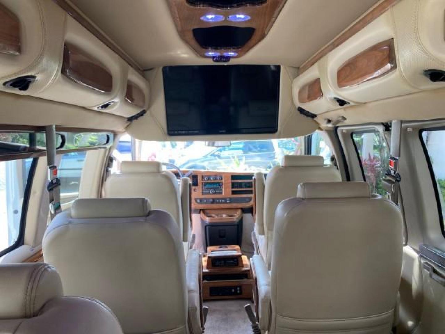 2012 Summit White /Neutral Chevrolet Express EXTENDED HIGH TOP CONVERSION 1 OWNER LOW MILES 36,054 (1GBWGLCG9C1) with an 6.0L Vortec 1000 V8 SFI Flex-Fuel Engine engine, Automatic transmission, located at 4701 North Dixie Hwy, Pompano Beach, FL, 33064, (954) 422-2889, 26.240938, -80.123474 - OUR WEBPAGE FLORIDACARS1.COM HAS OVER 100 PHOTOS AND FREE CARFAX LINK 2012 Chevrolet Express EXTENDED HIGH TOP CONVERSION VAN 1 OWNER Van 6.0L V8 F OHV 16V Flex Fuel 15 MPG Rear Wheel Drive Features ABS Brakes Air Conditioning Alloy Wheels AM/FM Stereo Automatic Transmission Auxiliary Audio Input Bl- Photo#85