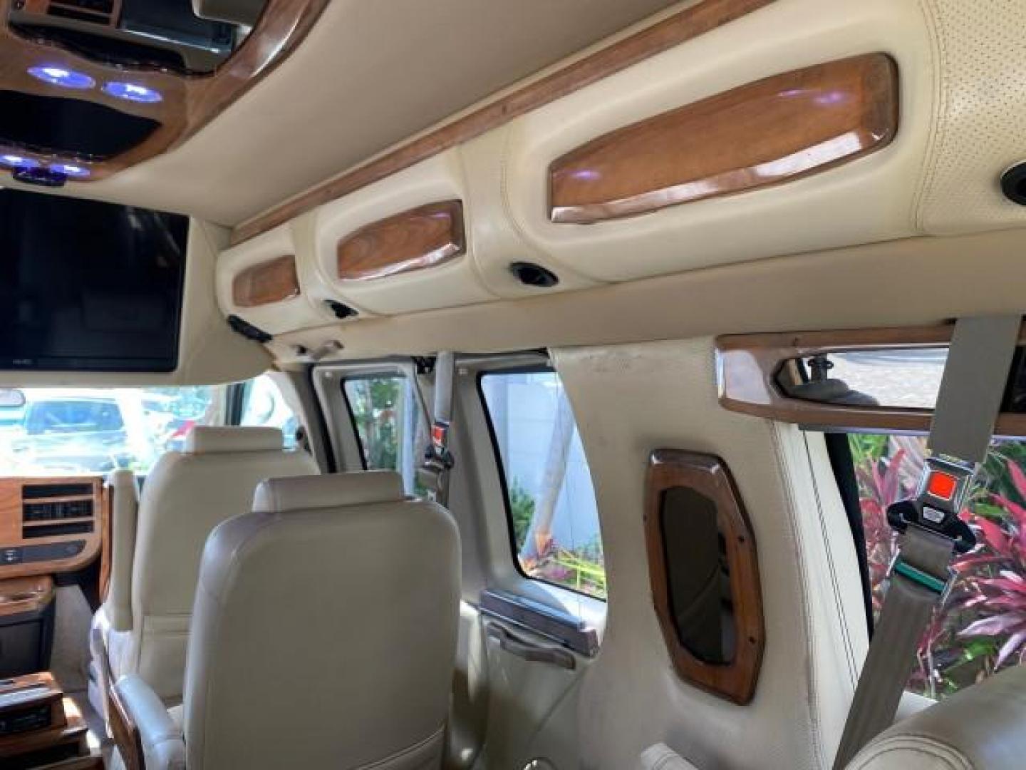 2012 Summit White /Neutral Chevrolet Express EXTENDED HIGH TOP CONVERSION 1 OWNER LOW MILES 36,054 (1GBWGLCG9C1) with an 6.0L Vortec 1000 V8 SFI Flex-Fuel Engine engine, Automatic transmission, located at 4701 North Dixie Hwy, Pompano Beach, FL, 33064, (954) 422-2889, 26.240938, -80.123474 - OUR WEBPAGE FLORIDACARS1.COM HAS OVER 100 PHOTOS AND FREE CARFAX LINK 2012 Chevrolet Express EXTENDED HIGH TOP CONVERSION VAN 1 OWNER Van 6.0L V8 F OHV 16V Flex Fuel 15 MPG Rear Wheel Drive Features ABS Brakes Air Conditioning Alloy Wheels AM/FM Stereo Automatic Transmission Auxiliary Audio Input Bl- Photo#87