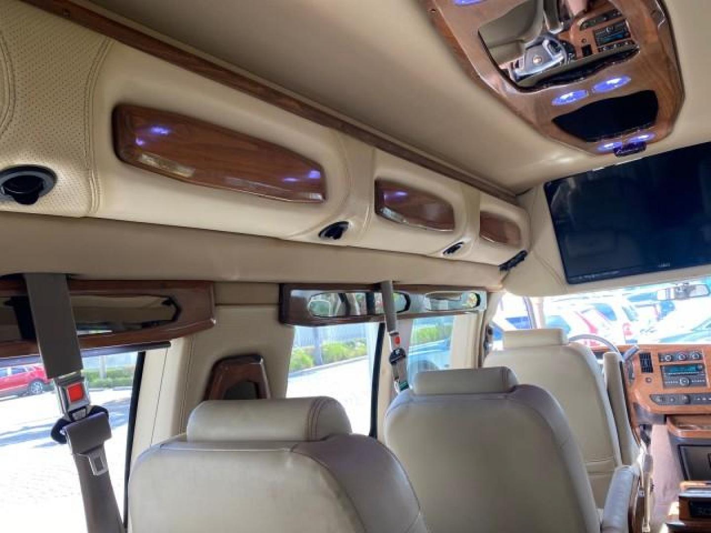 2012 Summit White /Neutral Chevrolet Express EXTENDED HIGH TOP CONVERSION 1 OWNER LOW MILES 36,054 (1GBWGLCG9C1) with an 6.0L Vortec 1000 V8 SFI Flex-Fuel Engine engine, Automatic transmission, located at 4701 North Dixie Hwy, Pompano Beach, FL, 33064, (954) 422-2889, 26.240938, -80.123474 - OUR WEBPAGE FLORIDACARS1.COM HAS OVER 100 PHOTOS AND FREE CARFAX LINK 2012 Chevrolet Express EXTENDED HIGH TOP CONVERSION VAN 1 OWNER Van 6.0L V8 F OHV 16V Flex Fuel 15 MPG Rear Wheel Drive Features ABS Brakes Air Conditioning Alloy Wheels AM/FM Stereo Automatic Transmission Auxiliary Audio Input Bl- Photo#88