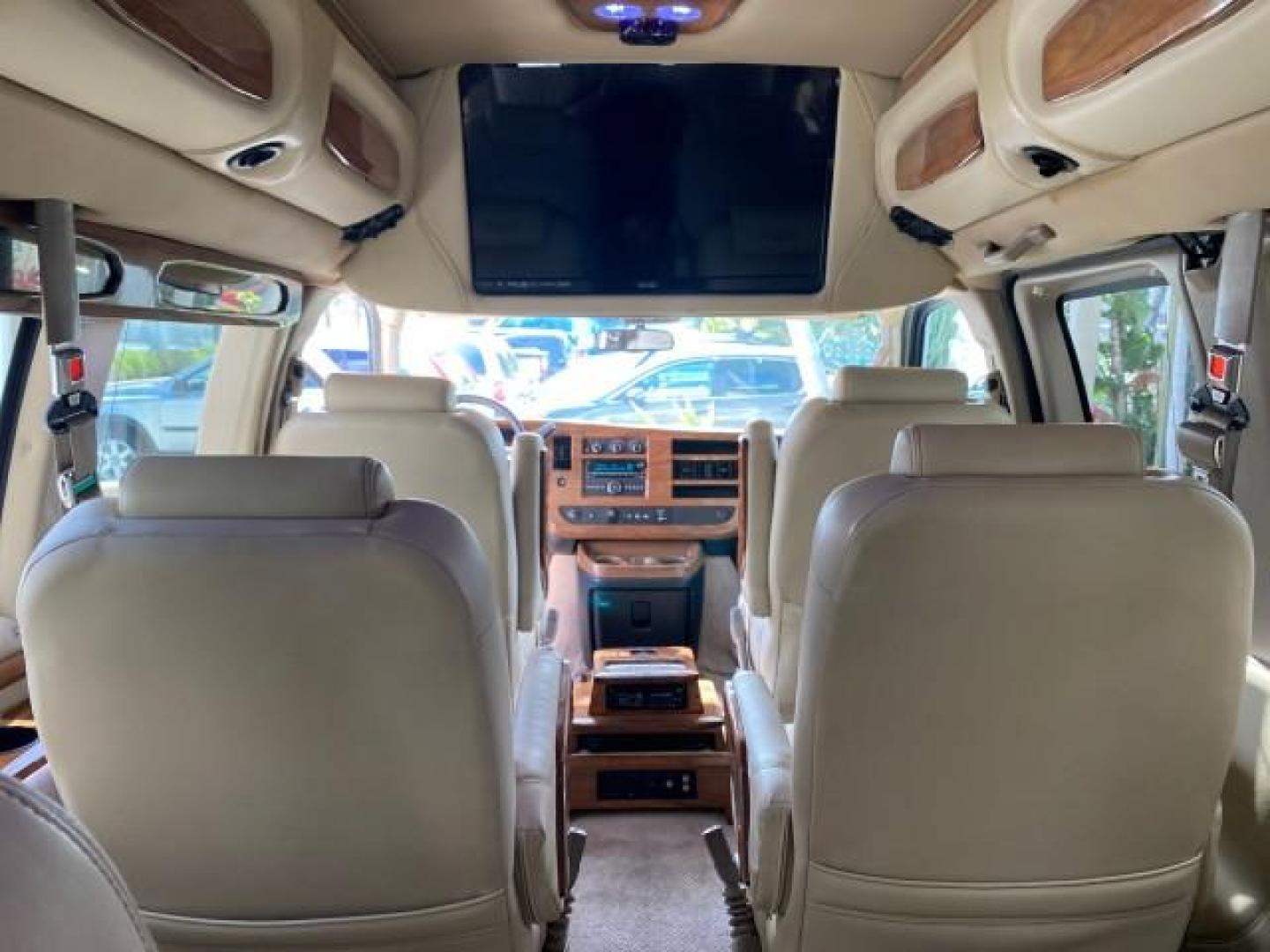 2012 Summit White /Neutral Chevrolet Express EXTENDED HIGH TOP CONVERSION 1 OWNER LOW MILES 36,054 (1GBWGLCG9C1) with an 6.0L Vortec 1000 V8 SFI Flex-Fuel Engine engine, Automatic transmission, located at 4701 North Dixie Hwy, Pompano Beach, FL, 33064, (954) 422-2889, 26.240938, -80.123474 - OUR WEBPAGE FLORIDACARS1.COM HAS OVER 100 PHOTOS AND FREE CARFAX LINK 2012 Chevrolet Express EXTENDED HIGH TOP CONVERSION VAN 1 OWNER Van 6.0L V8 F OHV 16V Flex Fuel 15 MPG Rear Wheel Drive Features ABS Brakes Air Conditioning Alloy Wheels AM/FM Stereo Automatic Transmission Auxiliary Audio Input Bl- Photo#91