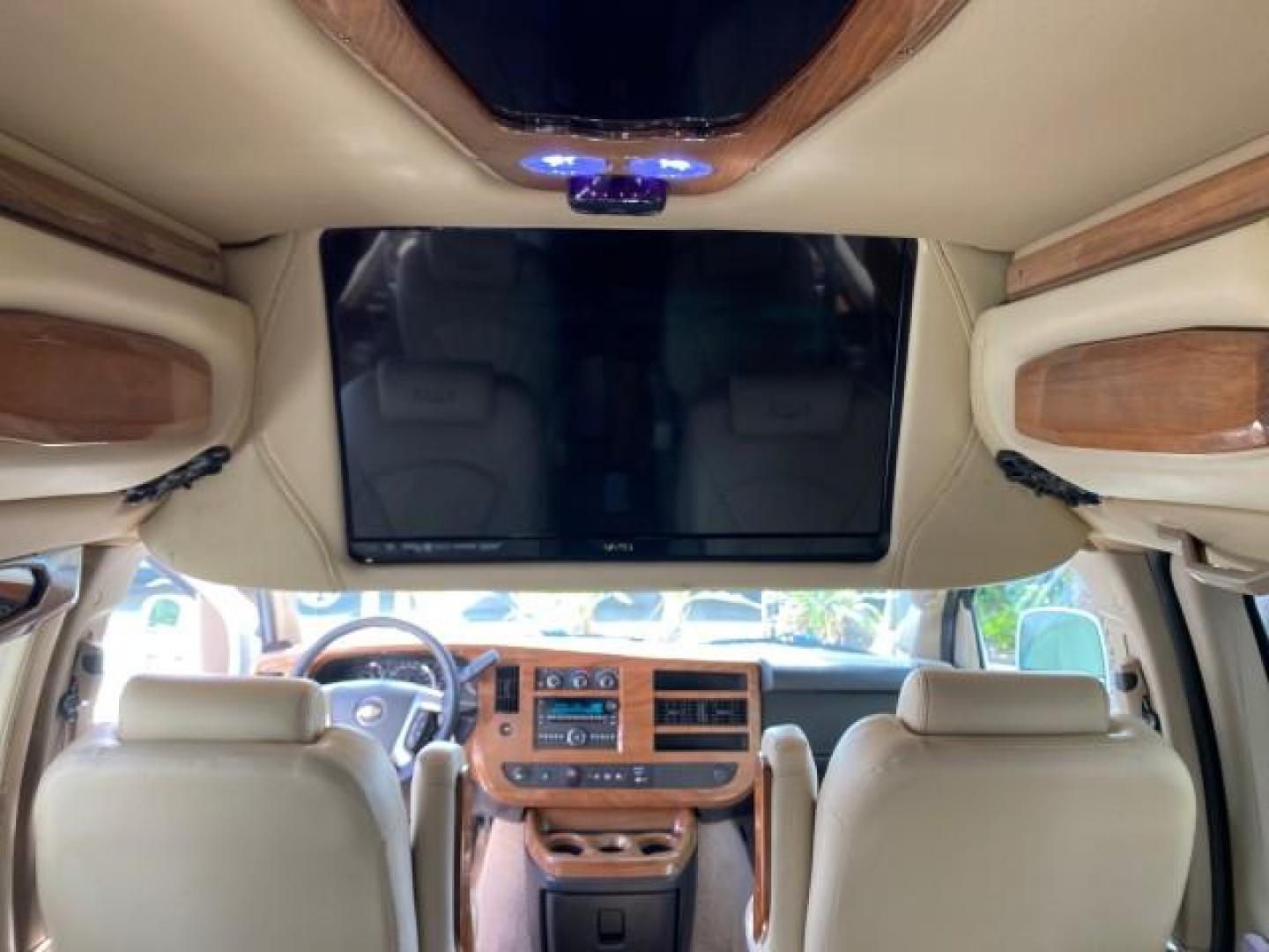 2012 Summit White /Neutral Chevrolet Express EXTENDED HIGH TOP CONVERSION 1 OWNER LOW MILES 36,054 (1GBWGLCG9C1) with an 6.0L Vortec 1000 V8 SFI Flex-Fuel Engine engine, Automatic transmission, located at 4701 North Dixie Hwy, Pompano Beach, FL, 33064, (954) 422-2889, 26.240938, -80.123474 - OUR WEBPAGE FLORIDACARS1.COM HAS OVER 100 PHOTOS AND FREE CARFAX LINK 2012 Chevrolet Express EXTENDED HIGH TOP CONVERSION VAN 1 OWNER Van 6.0L V8 F OHV 16V Flex Fuel 15 MPG Rear Wheel Drive Features ABS Brakes Air Conditioning Alloy Wheels AM/FM Stereo Automatic Transmission Auxiliary Audio Input Bl- Photo#92