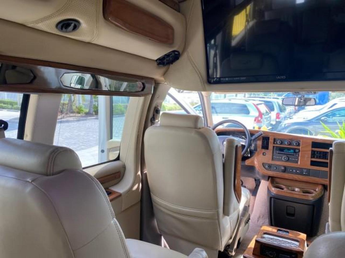 2012 Summit White /Neutral Chevrolet Express EXTENDED HIGH TOP CONVERSION 1 OWNER LOW MILES 36,054 (1GBWGLCG9C1) with an 6.0L Vortec 1000 V8 SFI Flex-Fuel Engine engine, Automatic transmission, located at 4701 North Dixie Hwy, Pompano Beach, FL, 33064, (954) 422-2889, 26.240938, -80.123474 - OUR WEBPAGE FLORIDACARS1.COM HAS OVER 100 PHOTOS AND FREE CARFAX LINK 2012 Chevrolet Express EXTENDED HIGH TOP CONVERSION VAN 1 OWNER Van 6.0L V8 F OHV 16V Flex Fuel 15 MPG Rear Wheel Drive Features ABS Brakes Air Conditioning Alloy Wheels AM/FM Stereo Automatic Transmission Auxiliary Audio Input Bl- Photo#93