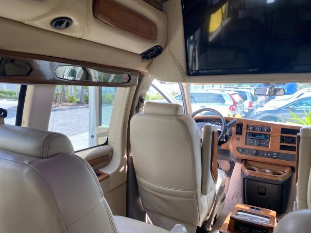 2012 Summit White /Neutral Chevrolet Express EXTENDED HIGH TOP CONVERSION 1 OWNER LOW MILES 36,054 (1GBWGLCG9C1) with an 6.0L Vortec 1000 V8 SFI Flex-Fuel Engine engine, Automatic transmission, located at 4701 North Dixie Hwy, Pompano Beach, FL, 33064, (954) 422-2889, 26.240938, -80.123474 - OUR WEBPAGE FLORIDACARS1.COM HAS OVER 100 PHOTOS AND FREE CARFAX LINK 2012 Chevrolet Express EXTENDED HIGH TOP CONVERSION VAN 1 OWNER Van 6.0L V8 F OHV 16V Flex Fuel 15 MPG Rear Wheel Drive Features ABS Brakes Air Conditioning Alloy Wheels AM/FM Stereo Automatic Transmission Auxiliary Audio Input Bl - Photo#93