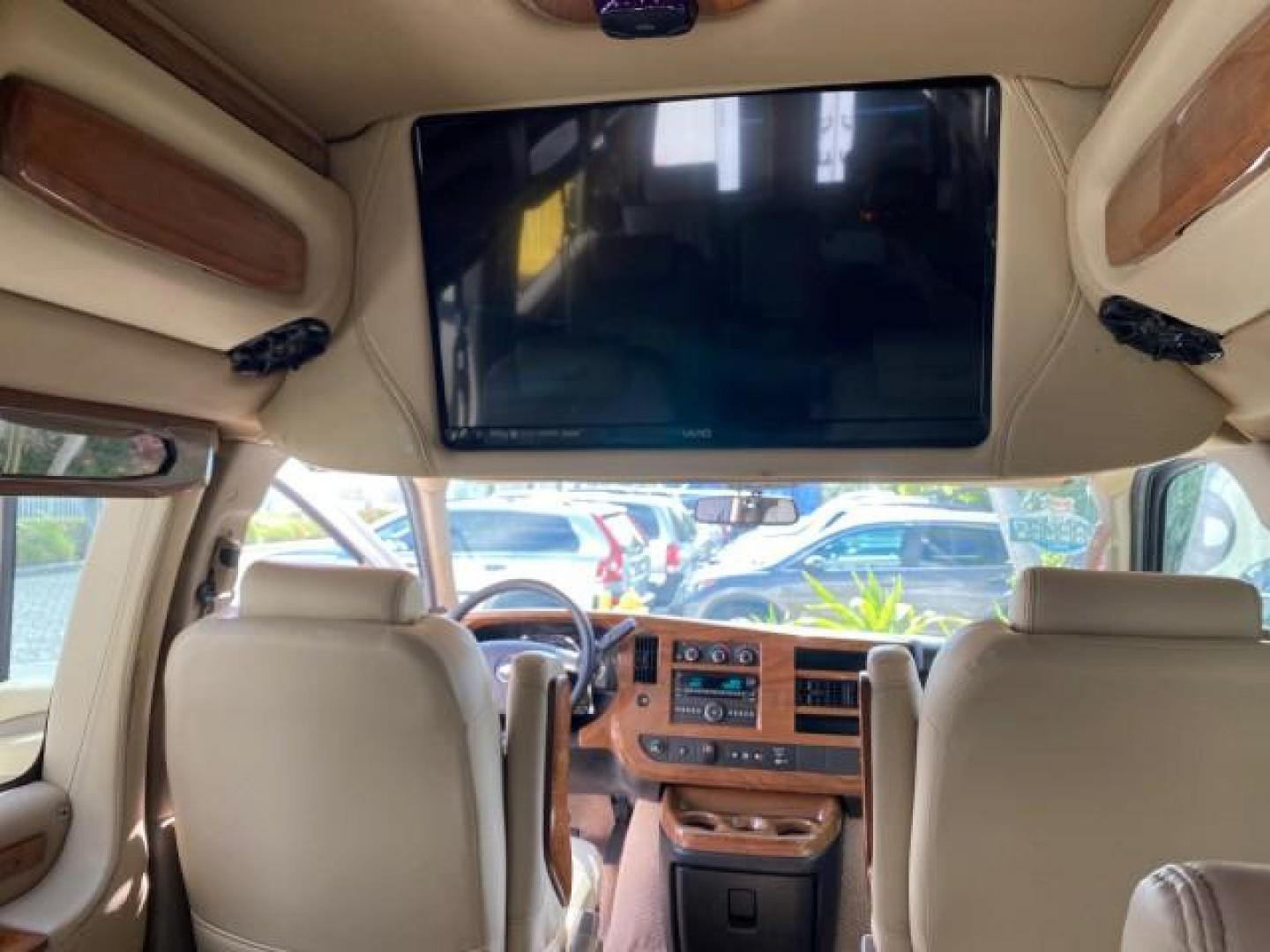 2012 Summit White /Neutral Chevrolet Express EXTENDED HIGH TOP CONVERSION 1 OWNER LOW MILES 36,054 (1GBWGLCG9C1) with an 6.0L Vortec 1000 V8 SFI Flex-Fuel Engine engine, Automatic transmission, located at 4701 North Dixie Hwy, Pompano Beach, FL, 33064, (954) 422-2889, 26.240938, -80.123474 - OUR WEBPAGE FLORIDACARS1.COM HAS OVER 100 PHOTOS AND FREE CARFAX LINK 2012 Chevrolet Express EXTENDED HIGH TOP CONVERSION VAN 1 OWNER Van 6.0L V8 F OHV 16V Flex Fuel 15 MPG Rear Wheel Drive Features ABS Brakes Air Conditioning Alloy Wheels AM/FM Stereo Automatic Transmission Auxiliary Audio Input Bl- Photo#95