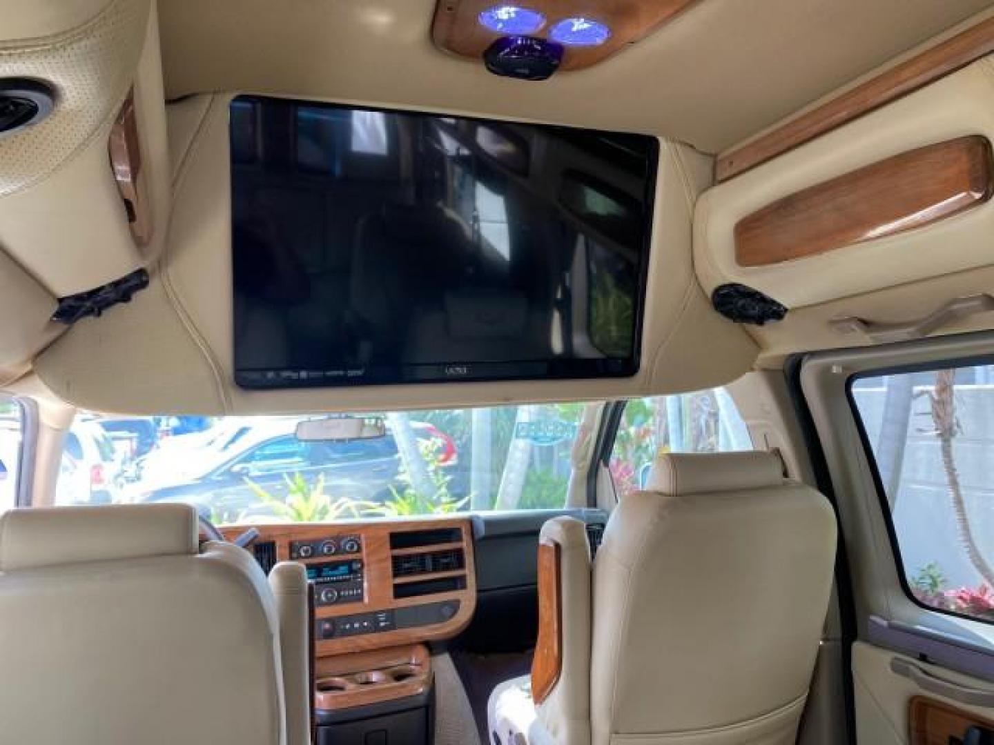2012 Summit White /Neutral Chevrolet Express EXTENDED HIGH TOP CONVERSION 1 OWNER LOW MILES 36,054 (1GBWGLCG9C1) with an 6.0L Vortec 1000 V8 SFI Flex-Fuel Engine engine, Automatic transmission, located at 4701 North Dixie Hwy, Pompano Beach, FL, 33064, (954) 422-2889, 26.240938, -80.123474 - OUR WEBPAGE FLORIDACARS1.COM HAS OVER 100 PHOTOS AND FREE CARFAX LINK 2012 Chevrolet Express EXTENDED HIGH TOP CONVERSION VAN 1 OWNER Van 6.0L V8 F OHV 16V Flex Fuel 15 MPG Rear Wheel Drive Features ABS Brakes Air Conditioning Alloy Wheels AM/FM Stereo Automatic Transmission Auxiliary Audio Input Bl- Photo#97