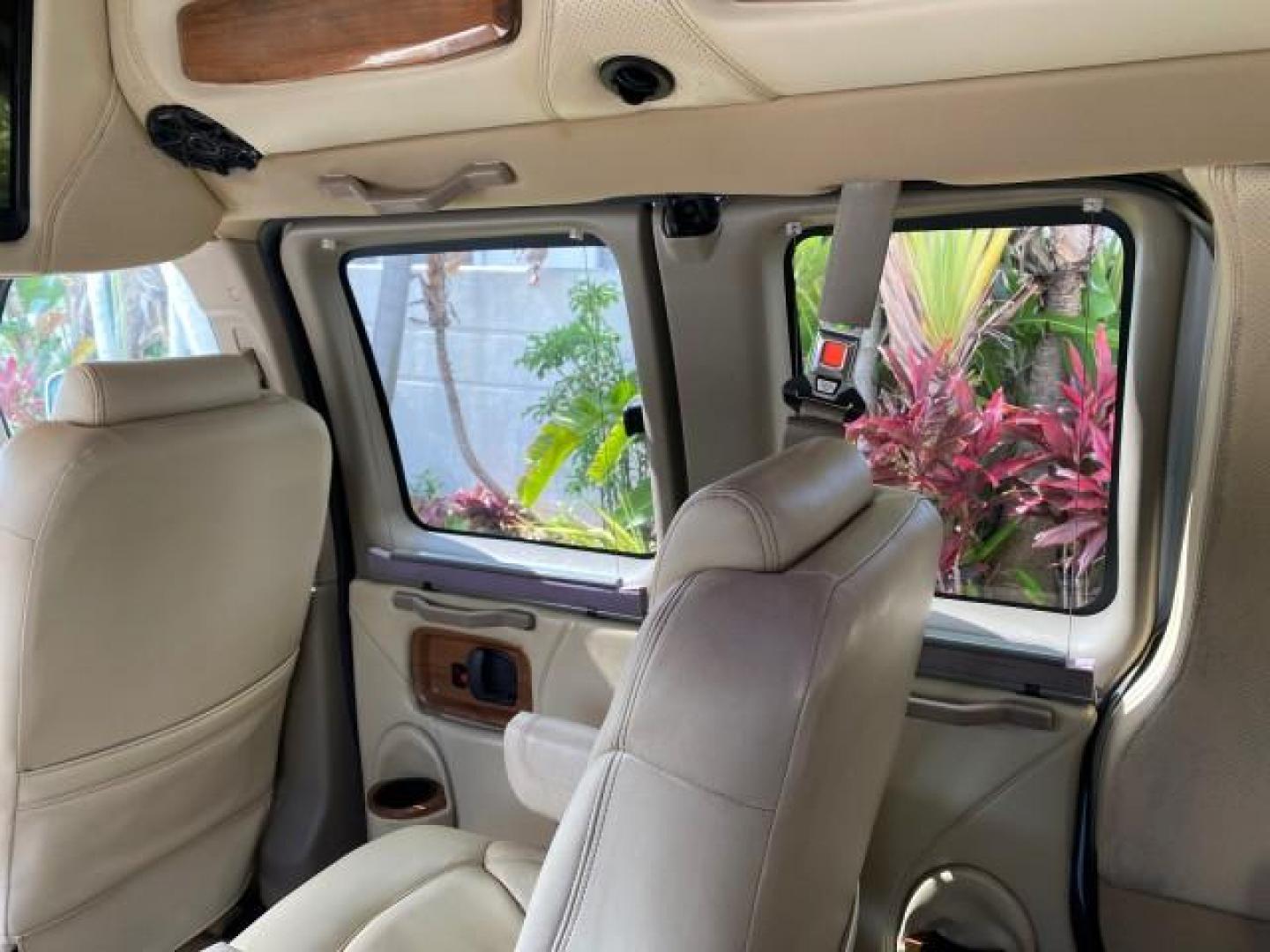 2012 Summit White /Neutral Chevrolet Express EXTENDED HIGH TOP CONVERSION 1 OWNER LOW MILES 36,054 (1GBWGLCG9C1) with an 6.0L Vortec 1000 V8 SFI Flex-Fuel Engine engine, Automatic transmission, located at 4701 North Dixie Hwy, Pompano Beach, FL, 33064, (954) 422-2889, 26.240938, -80.123474 - OUR WEBPAGE FLORIDACARS1.COM HAS OVER 100 PHOTOS AND FREE CARFAX LINK 2012 Chevrolet Express EXTENDED HIGH TOP CONVERSION VAN 1 OWNER Van 6.0L V8 F OHV 16V Flex Fuel 15 MPG Rear Wheel Drive Features ABS Brakes Air Conditioning Alloy Wheels AM/FM Stereo Automatic Transmission Auxiliary Audio Input Bl- Photo#98