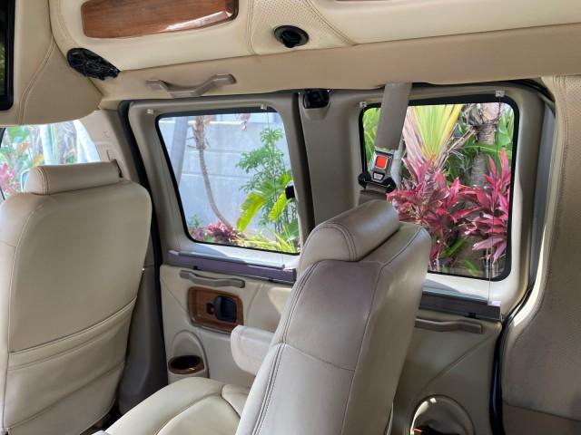 2012 Summit White /Neutral Chevrolet Express EXTENDED HIGH TOP CONVERSION 1 OWNER LOW MILES 36,054 (1GBWGLCG9C1) with an 6.0L Vortec 1000 V8 SFI Flex-Fuel Engine engine, Automatic transmission, located at 4701 North Dixie Hwy, Pompano Beach, FL, 33064, (954) 422-2889, 26.240938, -80.123474 - OUR WEBPAGE FLORIDACARS1.COM HAS OVER 100 PHOTOS AND FREE CARFAX LINK 2012 Chevrolet Express EXTENDED HIGH TOP CONVERSION VAN 1 OWNER Van 6.0L V8 F OHV 16V Flex Fuel 15 MPG Rear Wheel Drive Features ABS Brakes Air Conditioning Alloy Wheels AM/FM Stereo Automatic Transmission Auxiliary Audio Input Bl - Photo#98