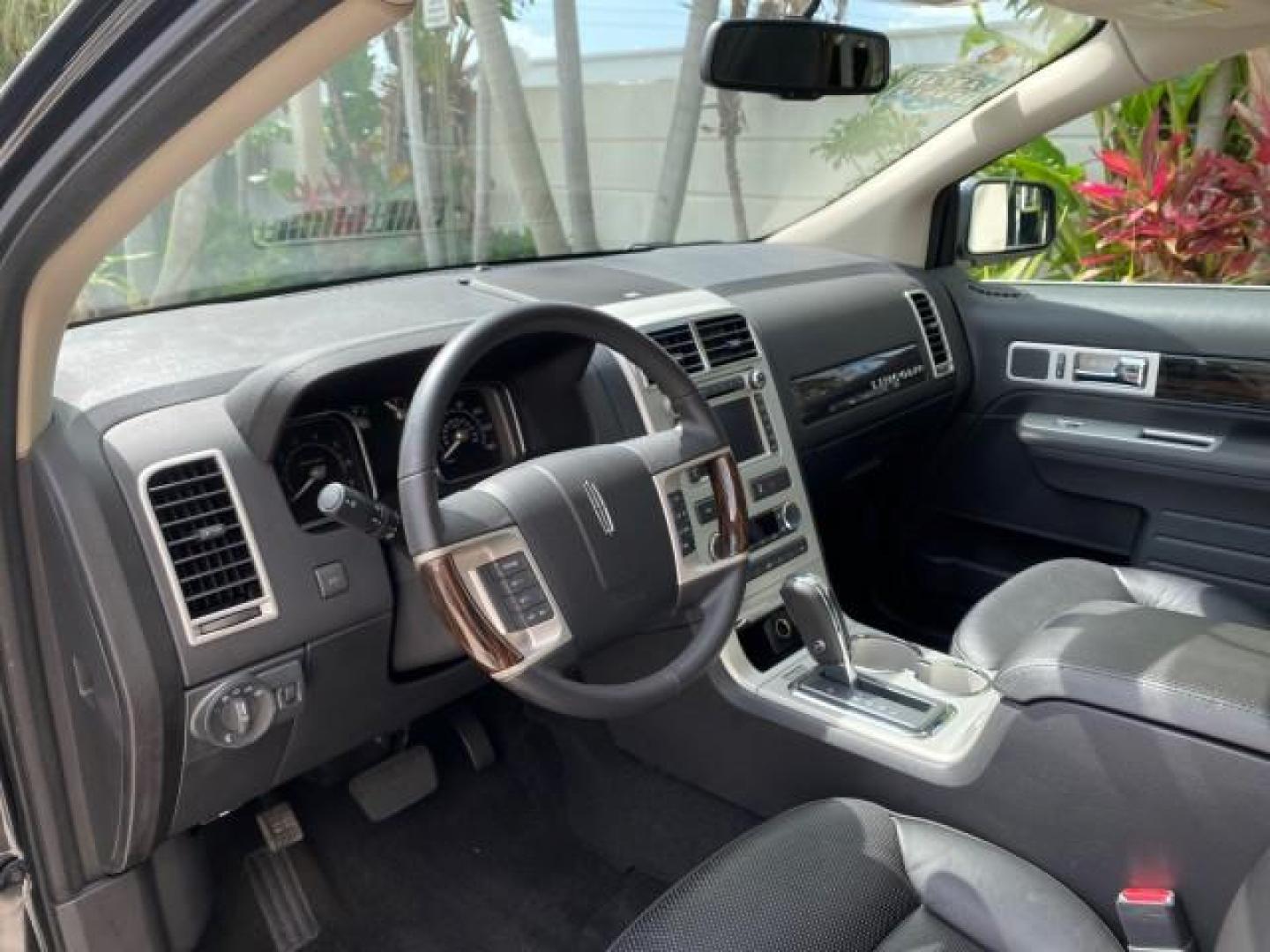 2010 Tuxedo Black Metallic /Charcoal Black Lincoln MKX 1 OWNER LOW MILES 27,203 SUNROOF NAV (2LMDJ6JC7AB) with an 3.5L DOHC 24-Valve V6 Duratec Engine engine, Automatic transmission, located at 4701 North Dixie Hwy, Pompano Beach, FL, 33064, (954) 422-2889, 26.240938, -80.123474 - OUR WEBPAGE FLORIDACARS1.COM HAS OVER 100 PHOTOS AND FREE CARFAX LINK 2010 Lincoln MKX 1 OWNER 4 Door Wagon/Sport Utility 3.5L V6 F DOHC 24V Gasoline 25 MPG Front Wheel Drive Features A/C Seat(s) ABS Brakes Air Conditioning Alloy Wheels AM/FM Stereo Automatic Transmission Auxiliary Audio Input Bluet - Photo#50