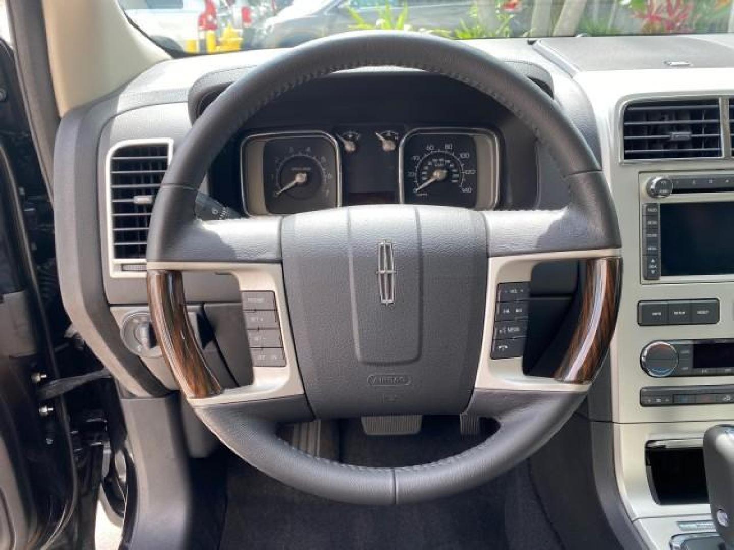 2010 Tuxedo Black Metallic /Charcoal Black Lincoln MKX 1 OWNER LOW MILES 27,203 SUNROOF NAV (2LMDJ6JC7AB) with an 3.5L DOHC 24-Valve V6 Duratec Engine engine, Automatic transmission, located at 4701 North Dixie Hwy, Pompano Beach, FL, 33064, (954) 422-2889, 26.240938, -80.123474 - OUR WEBPAGE FLORIDACARS1.COM HAS OVER 100 PHOTOS AND FREE CARFAX LINK 2010 Lincoln MKX 1 OWNER 4 Door Wagon/Sport Utility 3.5L V6 F DOHC 24V Gasoline 25 MPG Front Wheel Drive Features A/C Seat(s) ABS Brakes Air Conditioning Alloy Wheels AM/FM Stereo Automatic Transmission Auxiliary Audio Input Bluet - Photo#51