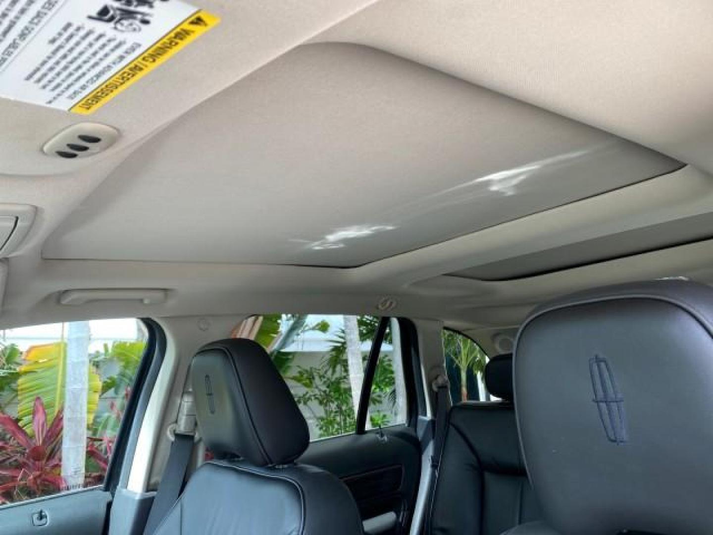 2010 Tuxedo Black Metallic /Charcoal Black Lincoln MKX 1 OWNER LOW MILES 27,203 SUNROOF NAV (2LMDJ6JC7AB) with an 3.5L DOHC 24-Valve V6 Duratec Engine engine, Automatic transmission, located at 4701 North Dixie Hwy, Pompano Beach, FL, 33064, (954) 422-2889, 26.240938, -80.123474 - OUR WEBPAGE FLORIDACARS1.COM HAS OVER 100 PHOTOS AND FREE CARFAX LINK 2010 Lincoln MKX 1 OWNER 4 Door Wagon/Sport Utility 3.5L V6 F DOHC 24V Gasoline 25 MPG Front Wheel Drive Features A/C Seat(s) ABS Brakes Air Conditioning Alloy Wheels AM/FM Stereo Automatic Transmission Auxiliary Audio Input Bluet - Photo#76