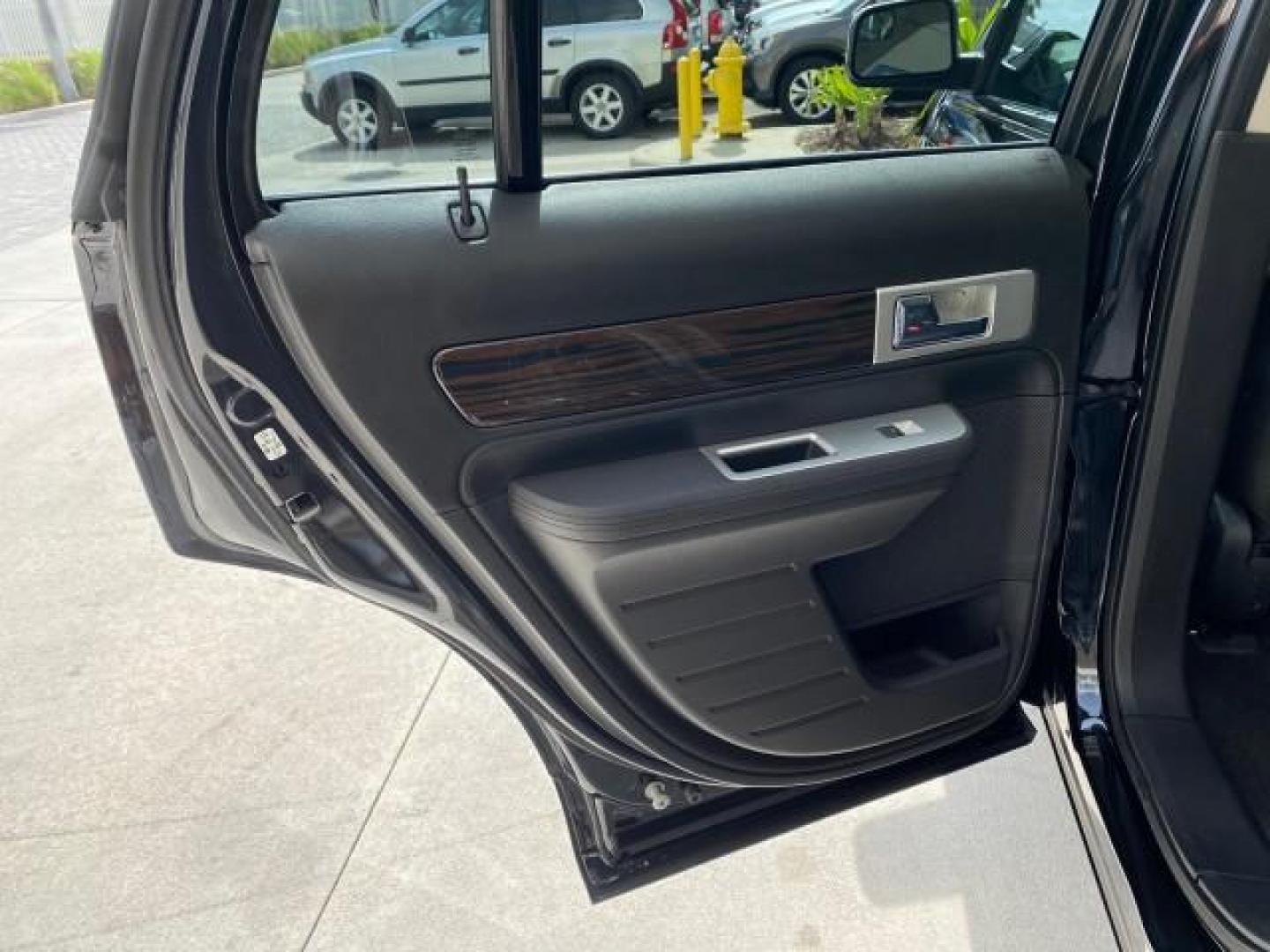 2010 Tuxedo Black Metallic /Charcoal Black Lincoln MKX 1 OWNER LOW MILES 27,203 SUNROOF NAV (2LMDJ6JC7AB) with an 3.5L DOHC 24-Valve V6 Duratec Engine engine, Automatic transmission, located at 4701 North Dixie Hwy, Pompano Beach, FL, 33064, (954) 422-2889, 26.240938, -80.123474 - OUR WEBPAGE FLORIDACARS1.COM HAS OVER 100 PHOTOS AND FREE CARFAX LINK 2010 Lincoln MKX 1 OWNER 4 Door Wagon/Sport Utility 3.5L V6 F DOHC 24V Gasoline 25 MPG Front Wheel Drive Features A/C Seat(s) ABS Brakes Air Conditioning Alloy Wheels AM/FM Stereo Automatic Transmission Auxiliary Audio Input Bluet - Photo#81