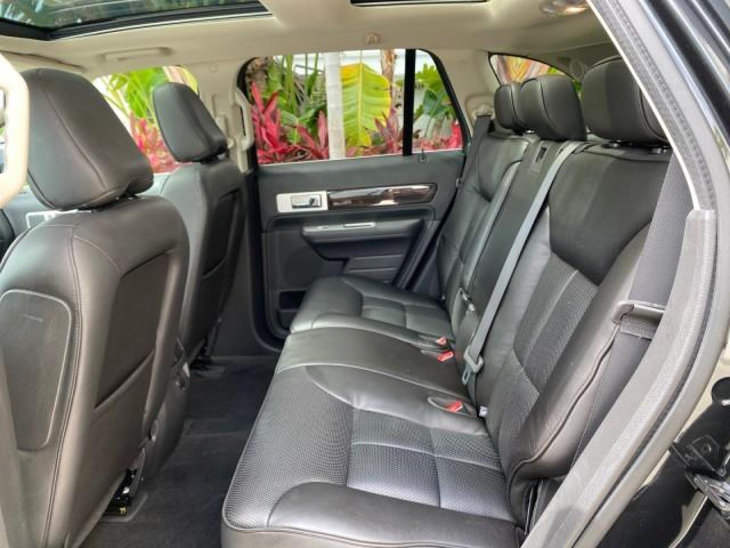 2010 Tuxedo Black Metallic /Charcoal Black Lincoln MKX 1 OWNER LOW MILES 27,203 SUNROOF NAV (2LMDJ6JC7AB) with an 3.5L DOHC 24-Valve V6 Duratec Engine engine, Automatic transmission, located at 4701 North Dixie Hwy, Pompano Beach, FL, 33064, (954) 422-2889, 26.240938, -80.123474 - OUR WEBPAGE FLORIDACARS1.COM HAS OVER 100 PHOTOS AND FREE CARFAX LINK 2010 Lincoln MKX 1 OWNER 4 Door Wagon/Sport Utility 3.5L V6 F DOHC 24V Gasoline 25 MPG Front Wheel Drive Features A/C Seat(s) ABS Brakes Air Conditioning Alloy Wheels AM/FM Stereo Automatic Transmission Auxiliary Audio Input Bluet - Photo#83